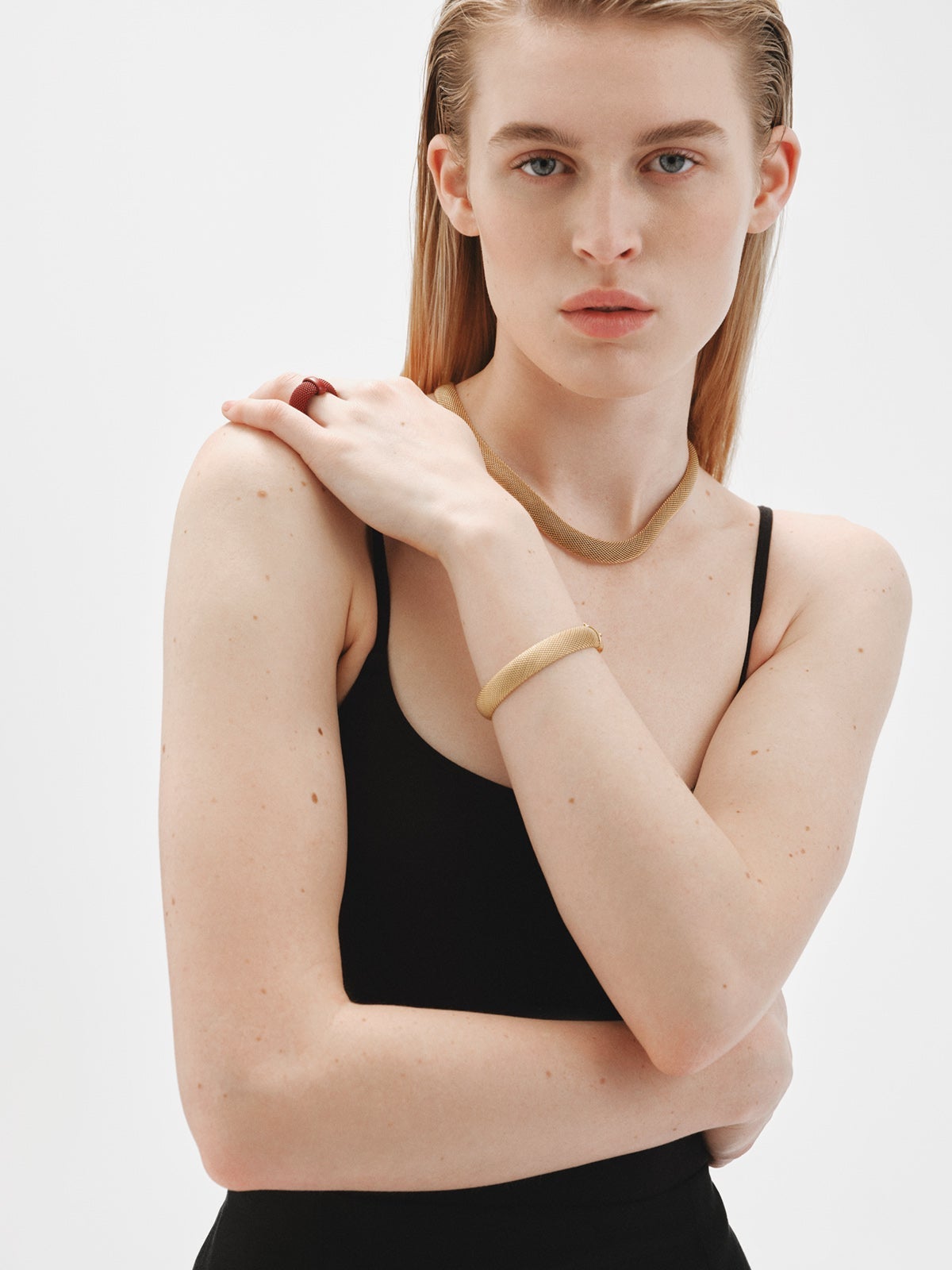 Colgante rígido de plata 925 bañada en oro amarillo de 18K con malla