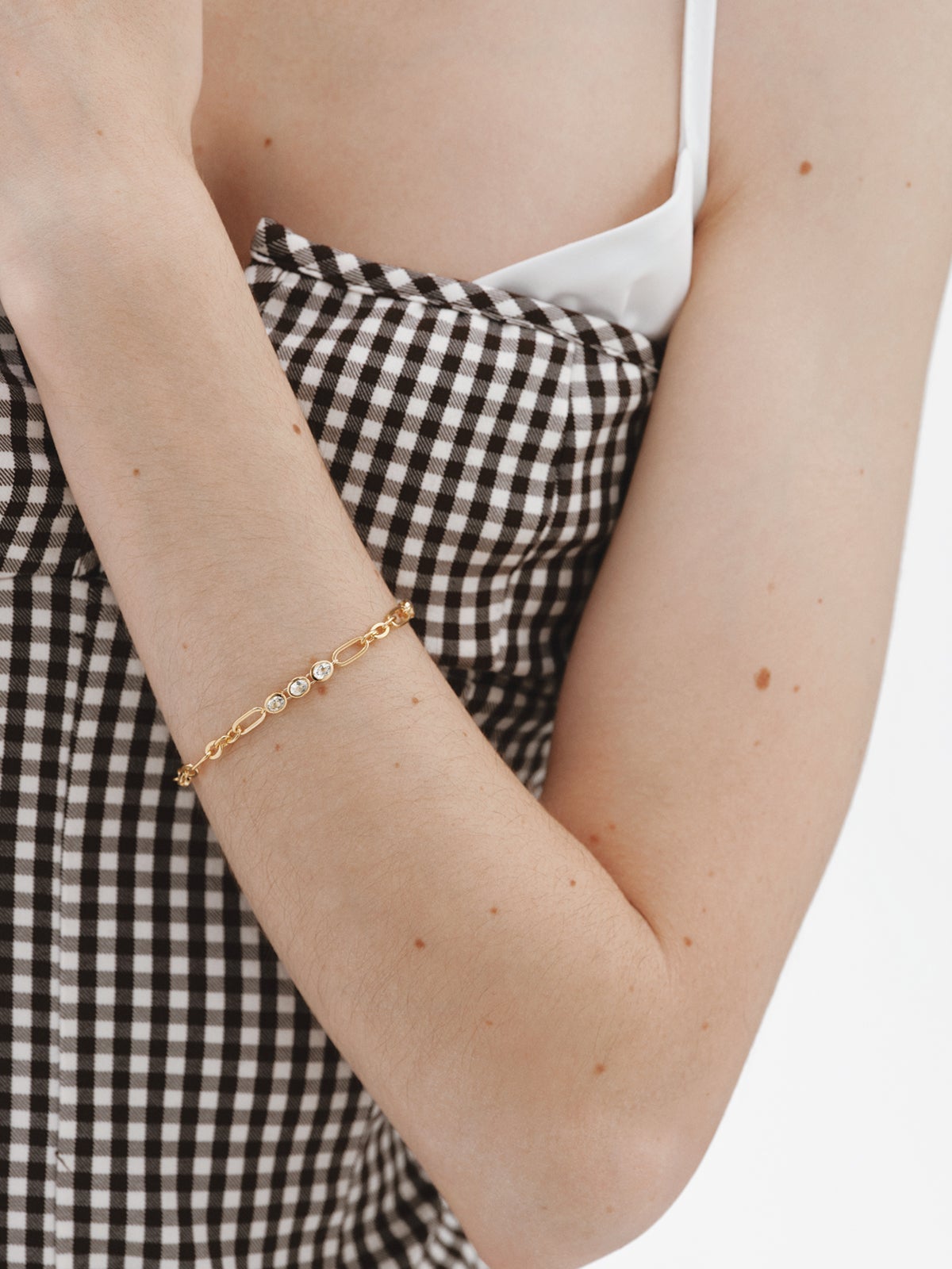 Pulsera de cadena de plata 925 bañada en oro amarillo de 18K con topacios blancos