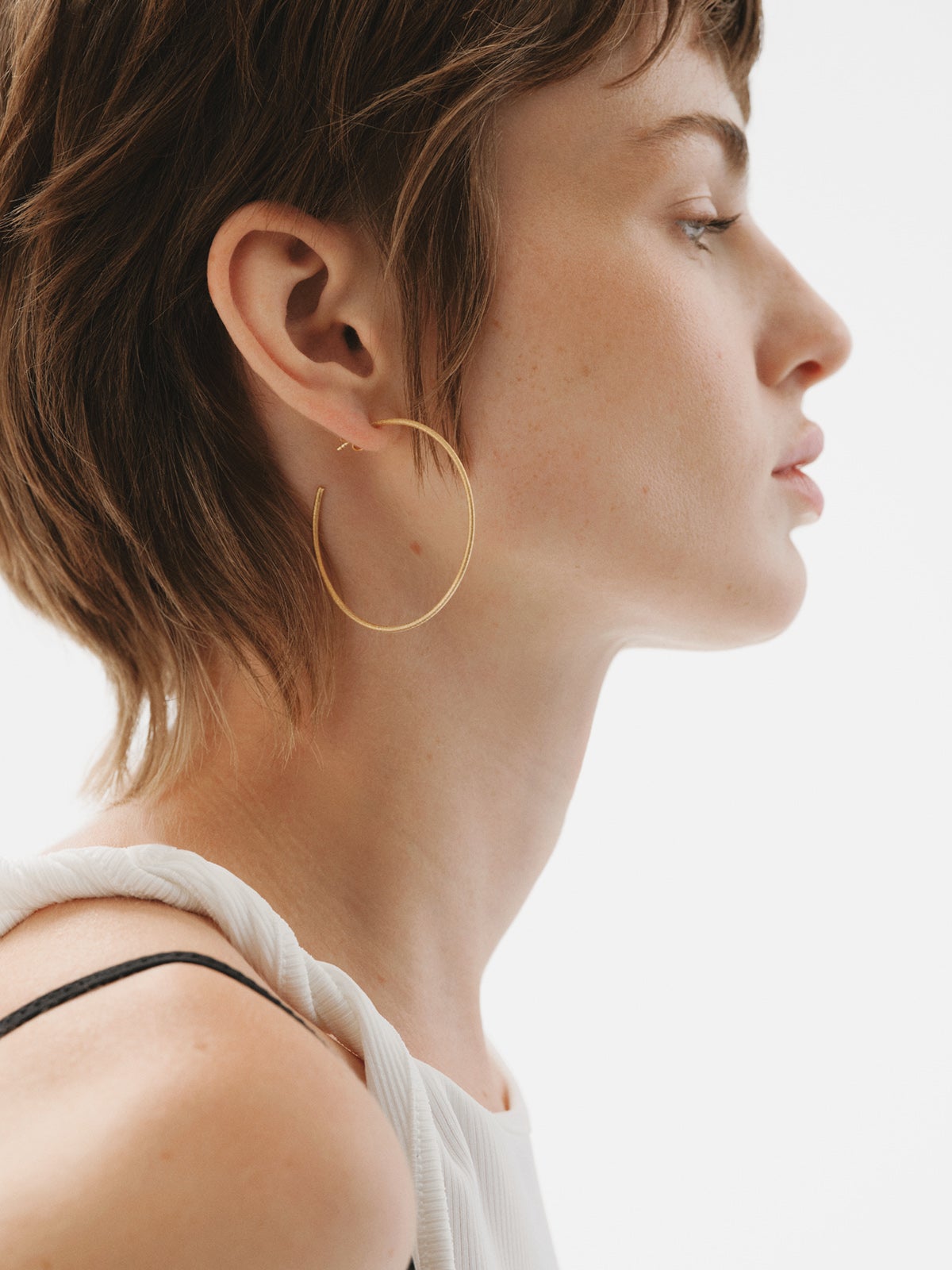 Pendientes de aro de plata 925 bañada en oro amarillo de 18K con textura