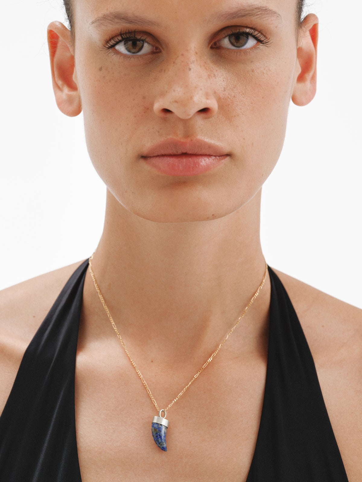 Charm de plata 925 con lapislázuli en forma de colmillo