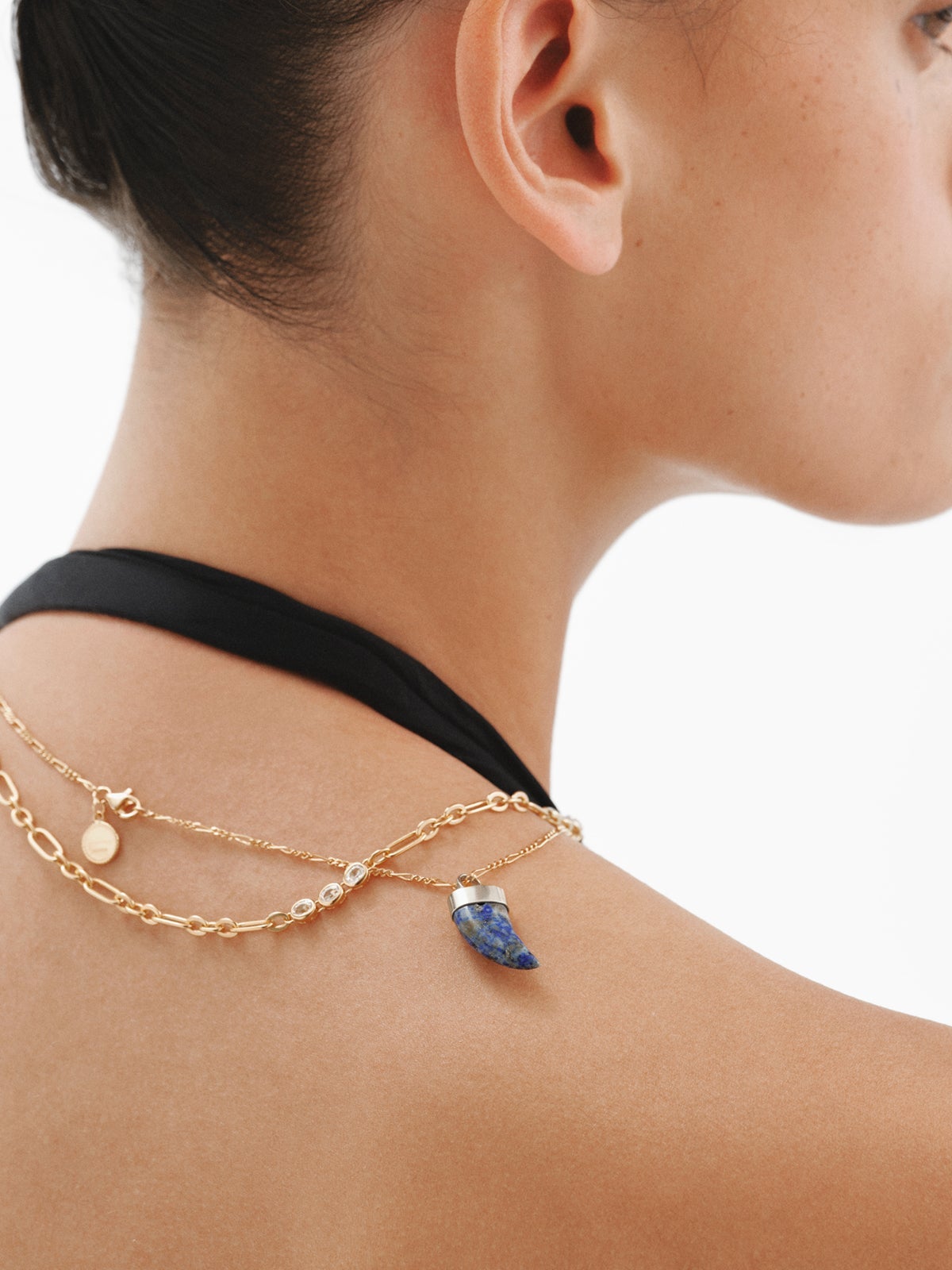 Charm de plata 925 con lapislázuli en forma de colmillo