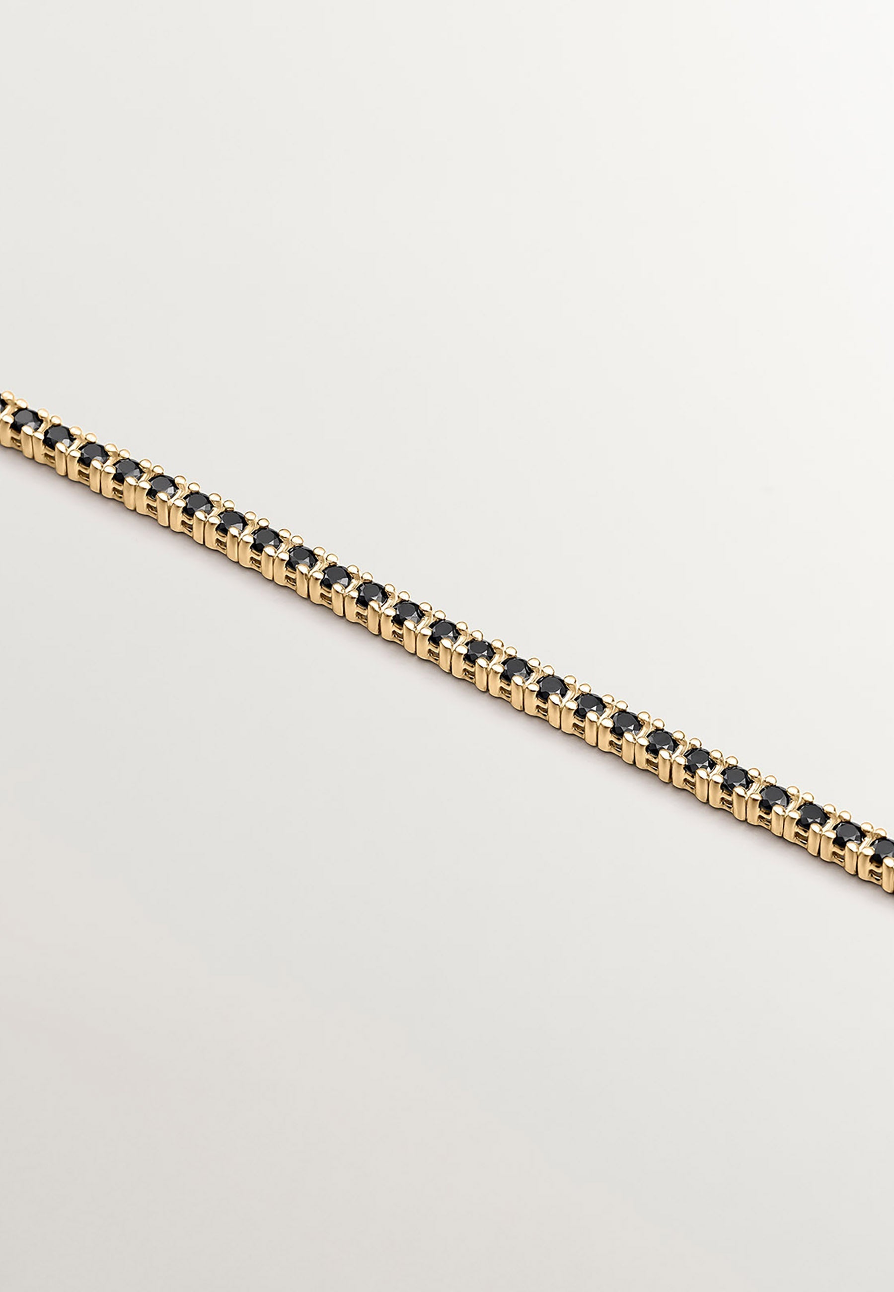 Pulsera de plata 925 bañada en oro amarillo de 18K con espinelas negras