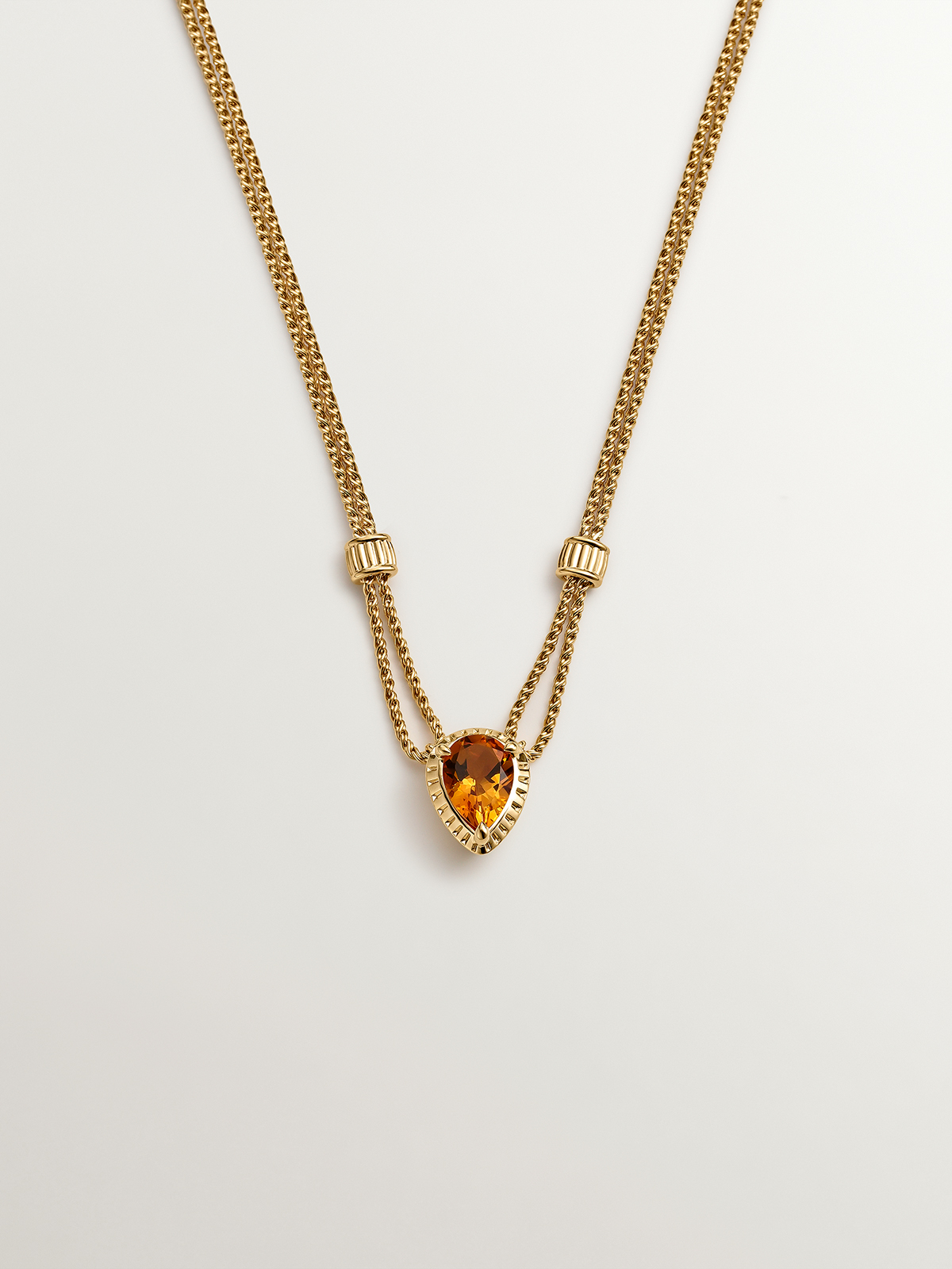 925 Silver pendant bathed in 18K yellow gold with yellow quartz