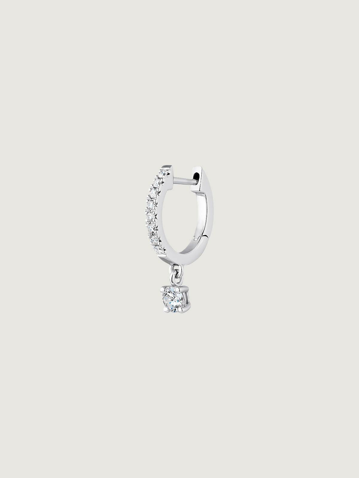 Individual small hoop earring in 18K white gold with 1.9 cts diamonds.