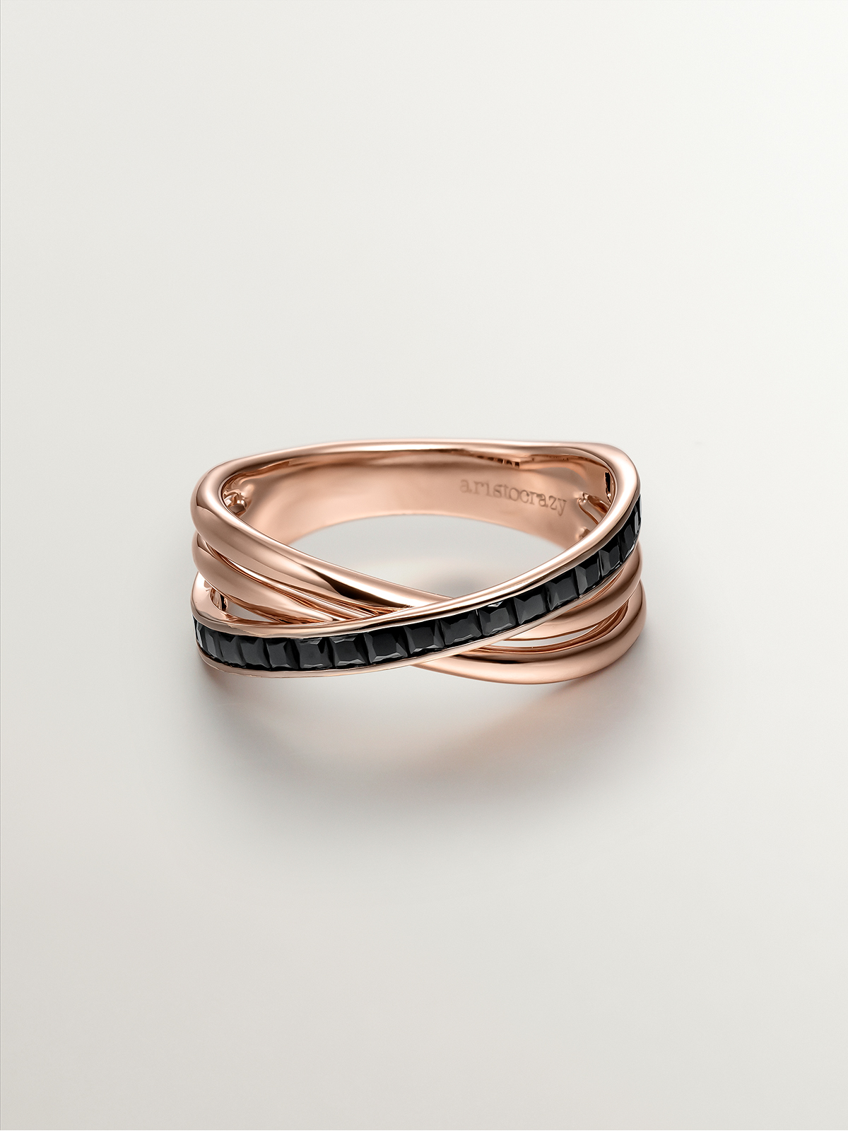 925 Silver double ring bathed in 18K rose gold with black spinels.