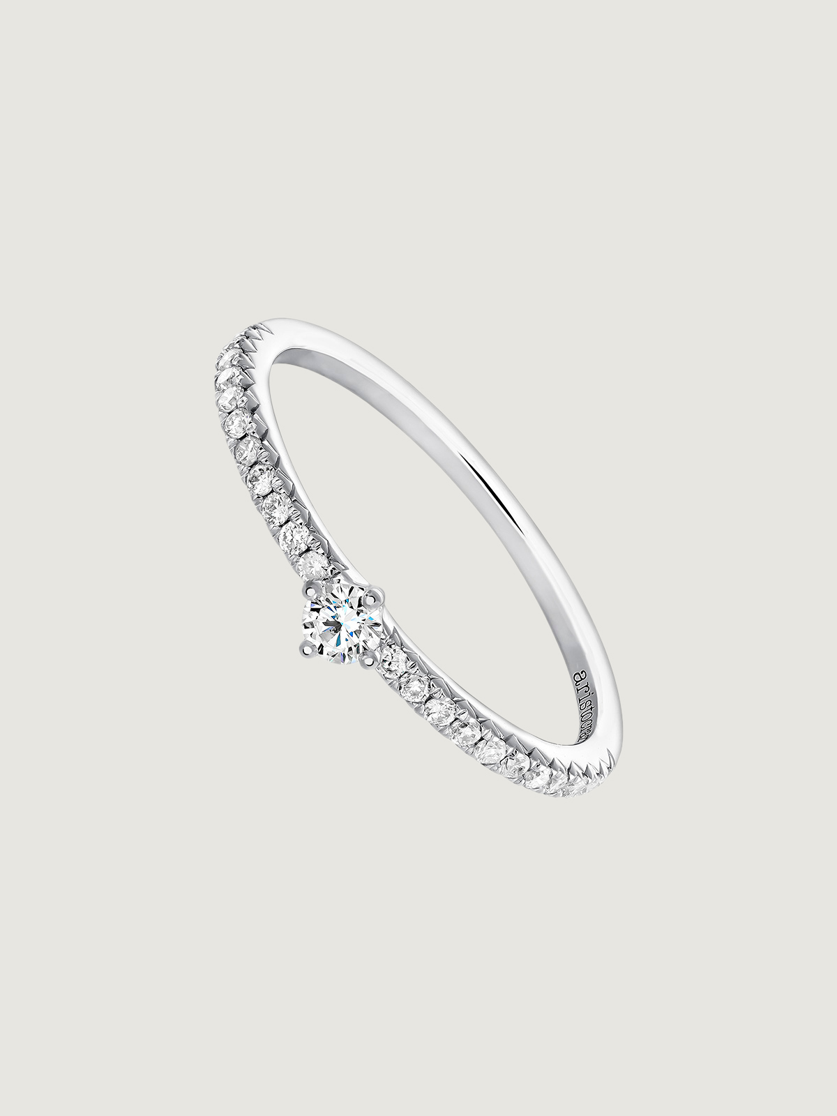 18K white gold ring with diamond arm and 0.23 cts central diamond.
