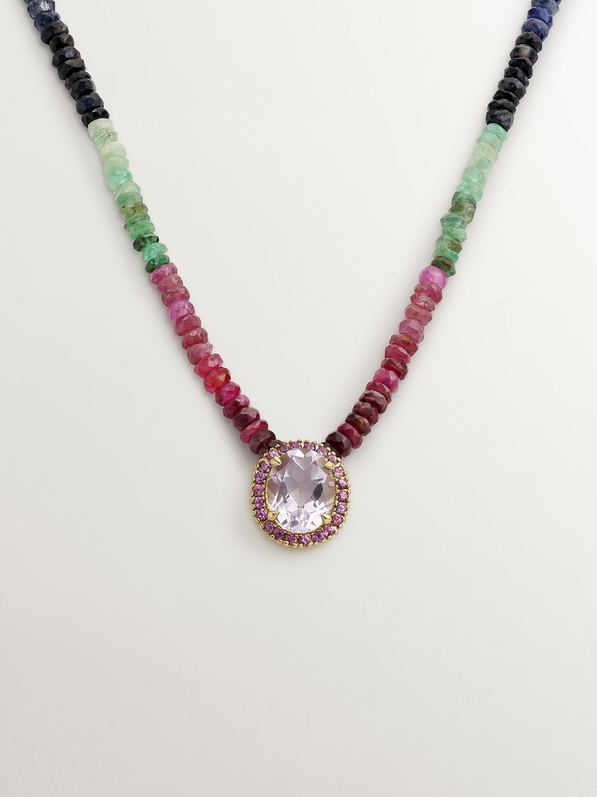 925 silver necklace bathed in 18K yellow gold with multicolor sapphires, pink rhodolite, and purple amethyst.