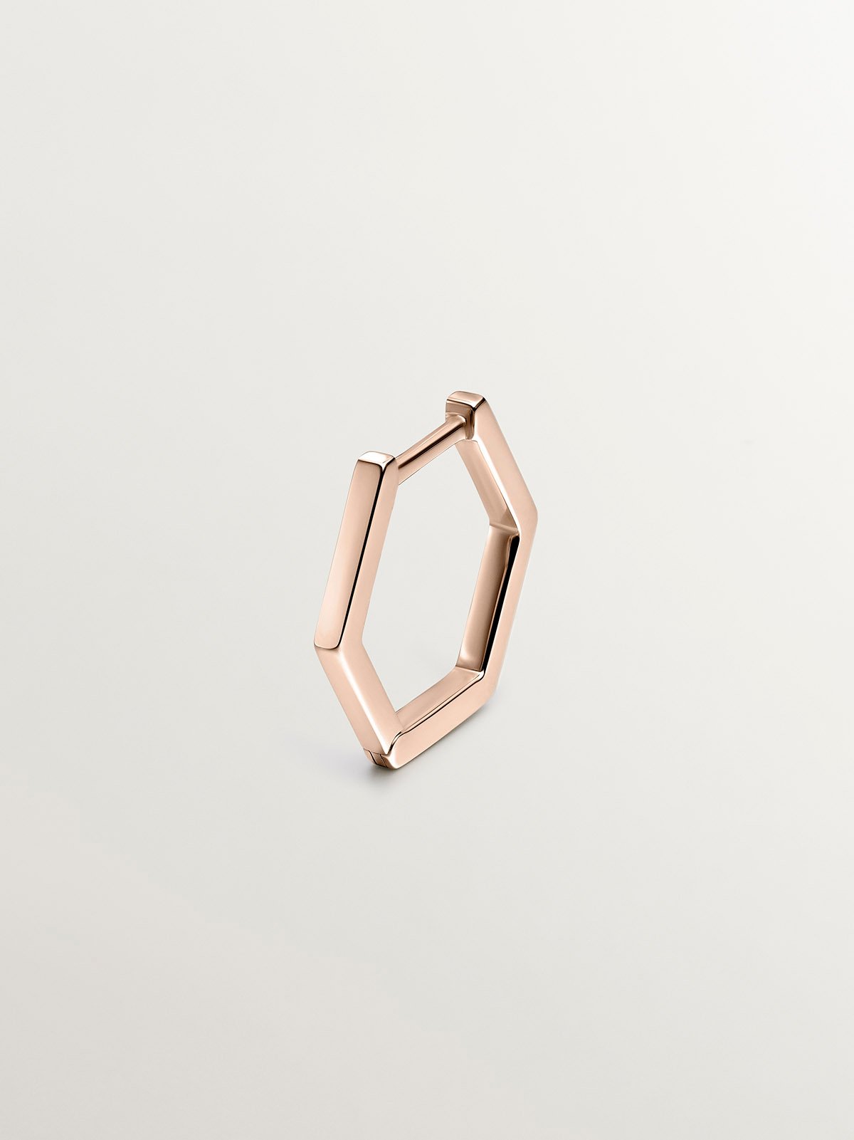 Pendiente individual de aro de oro rosa de 9K con forma hexagonal