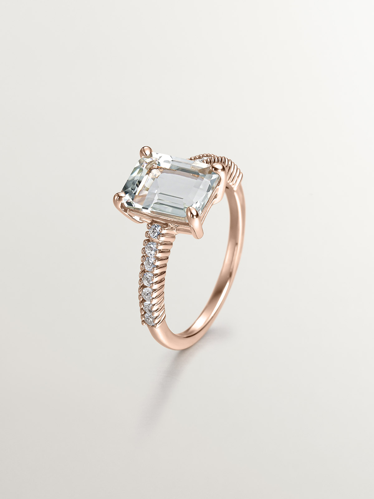 925 Silver ring bathed in 18K rose gold with green quartz and white topaz.