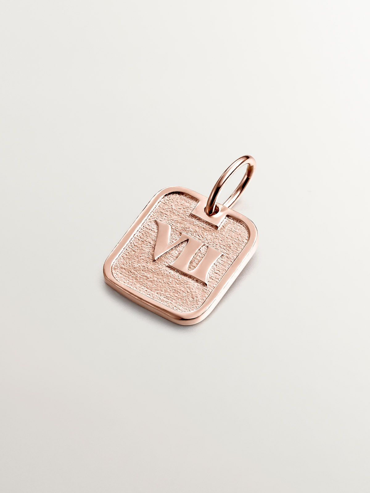 925 silver charm bathed in 18k rose gold with number 7