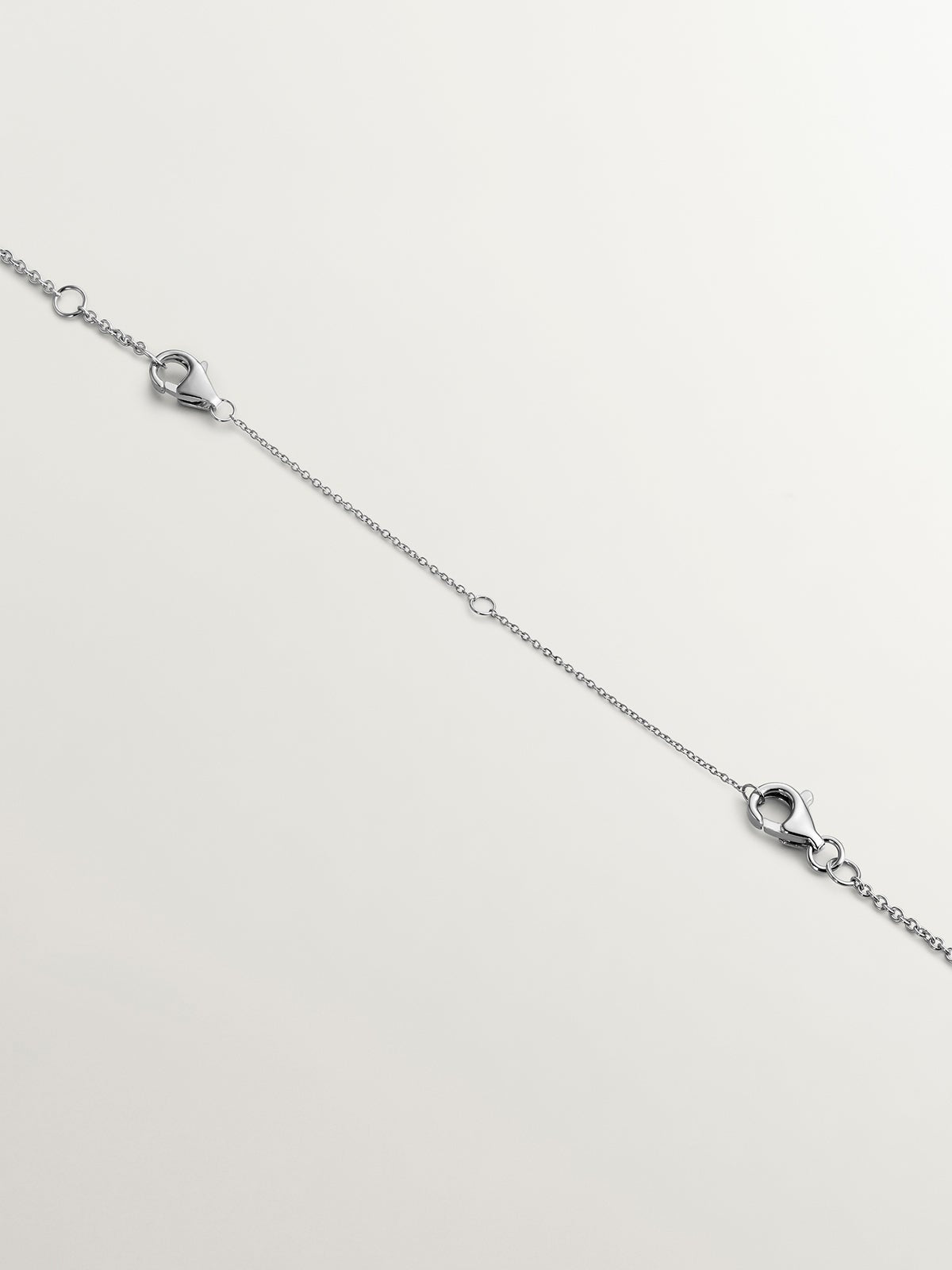 Alargador de oro blanco de 9K