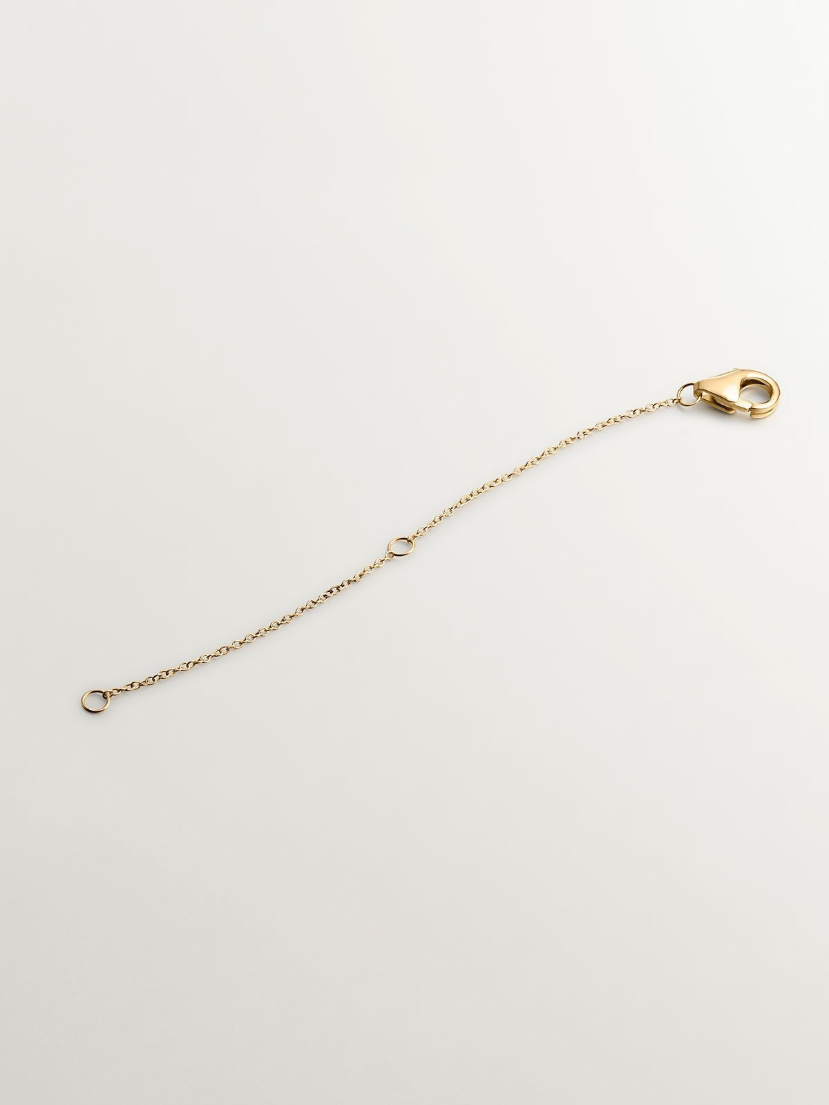 Alargador de oro amarillo de 9K