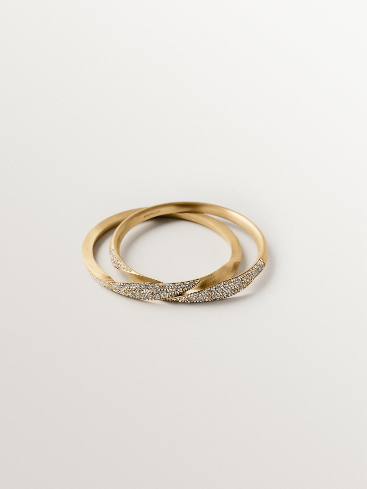 Pulsera gimmel bañada en oro amarillo con pavé de cristales