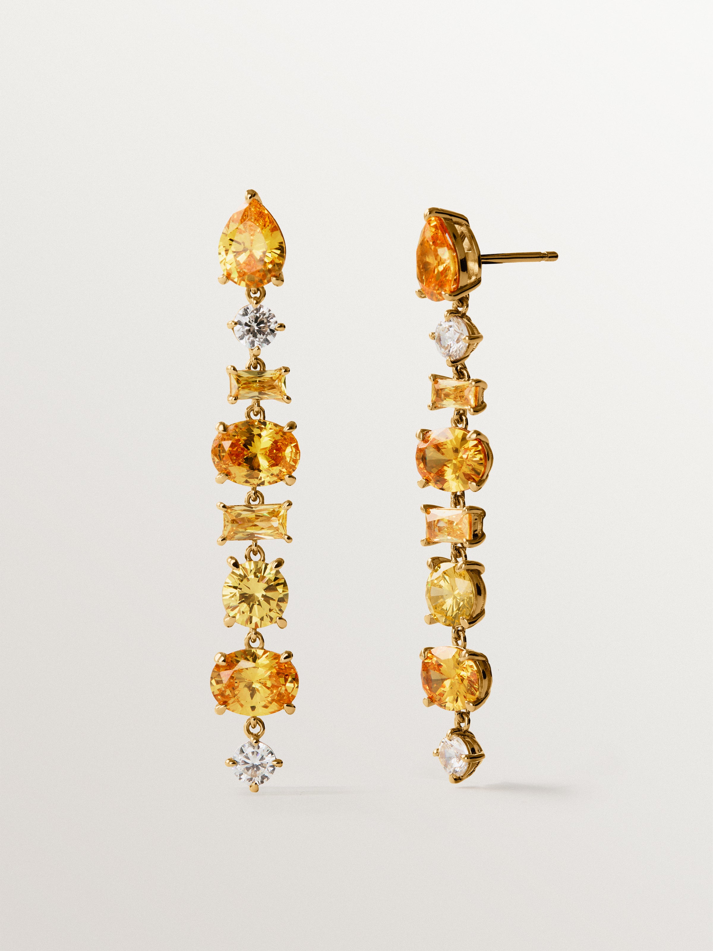 Pendientes largos bañados en oro amarillo con cristales amarillos