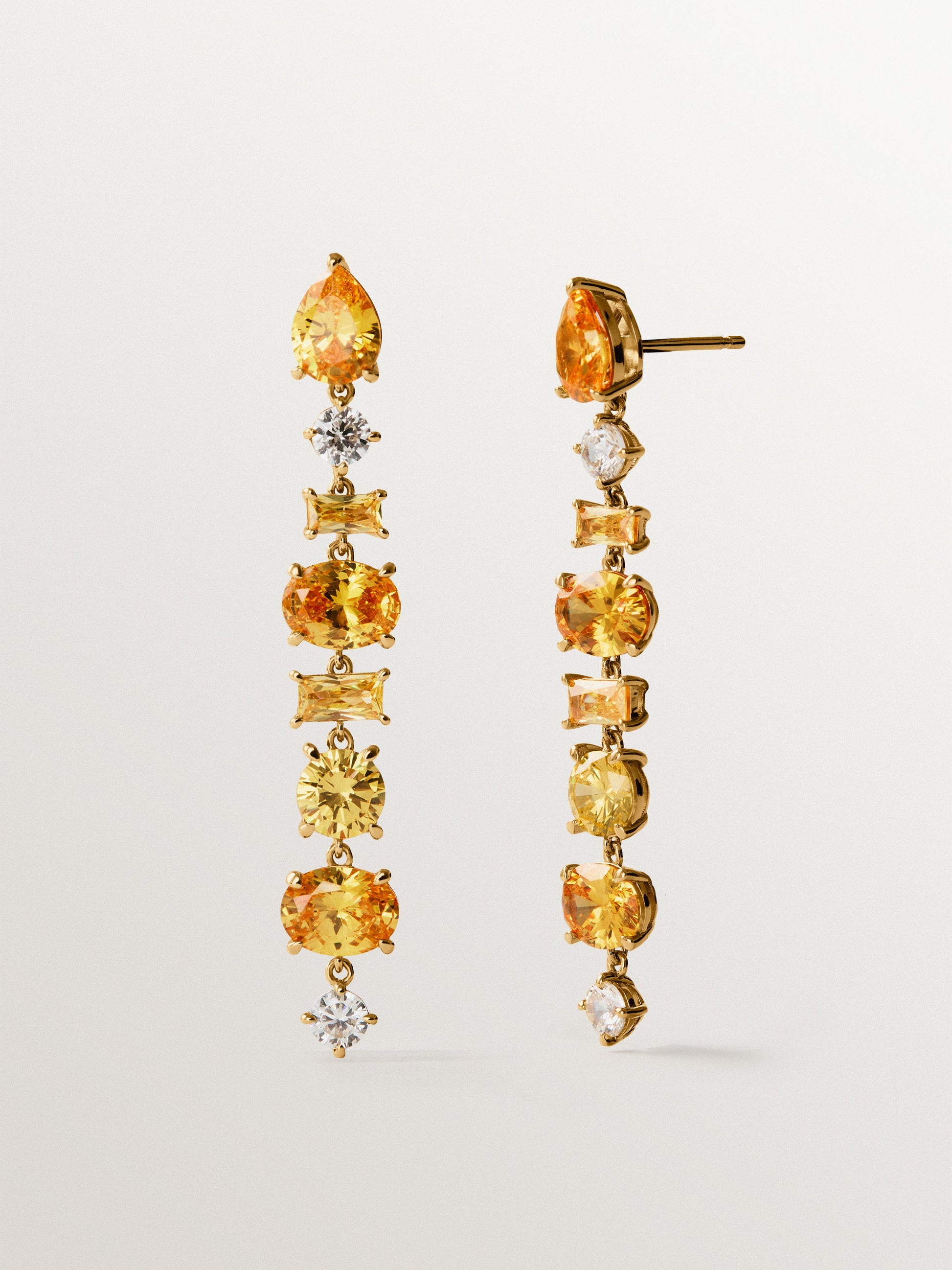Pendientes largos bañados en oro amarillo con cristales amarillos
