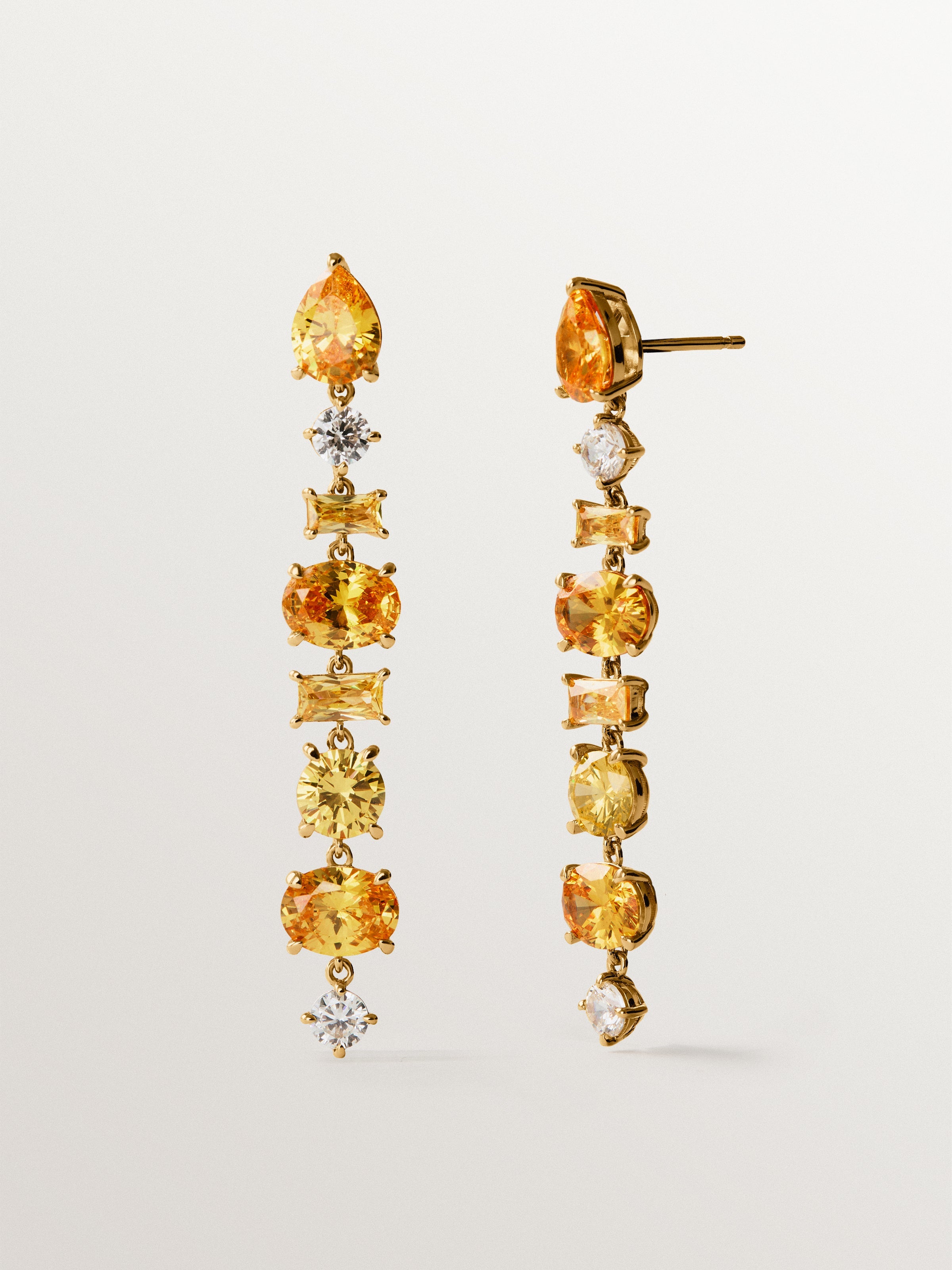 Pendientes largos bañados en oro amarillo con cristales amarillos