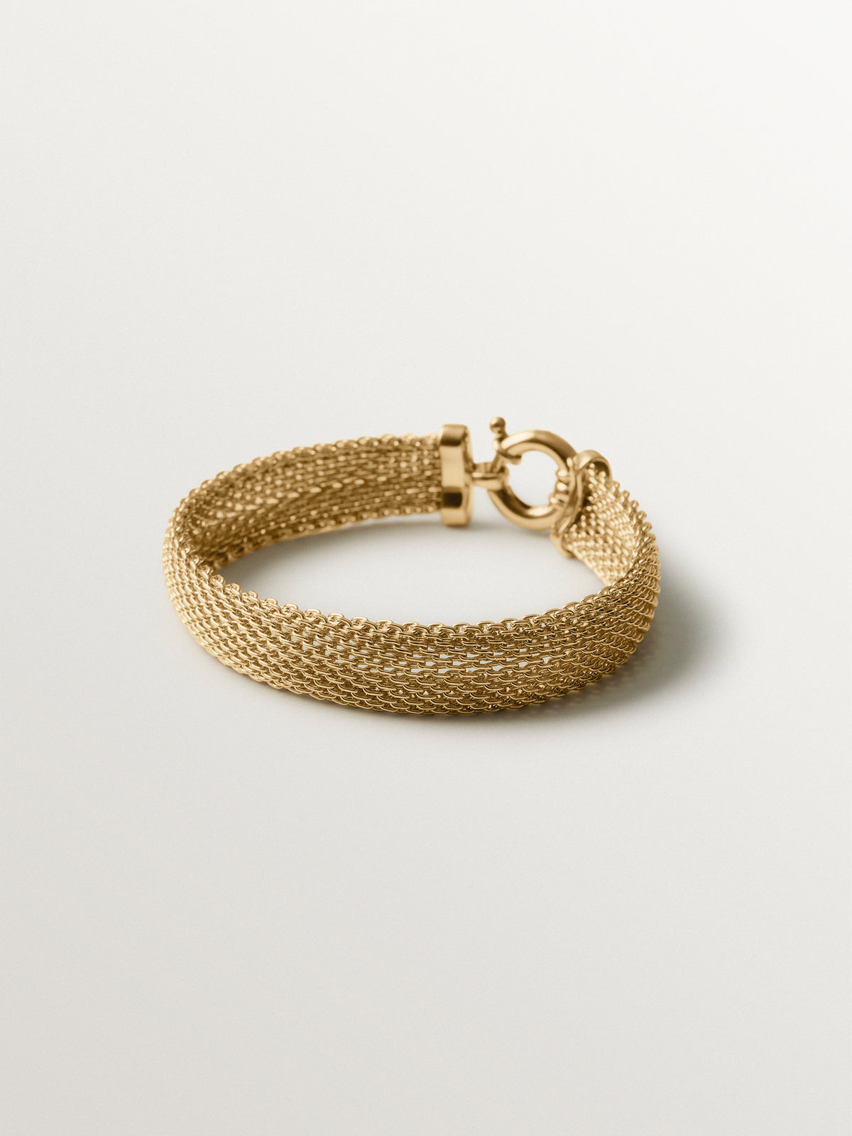 Pulsera de malla bañada en oro amarillo 