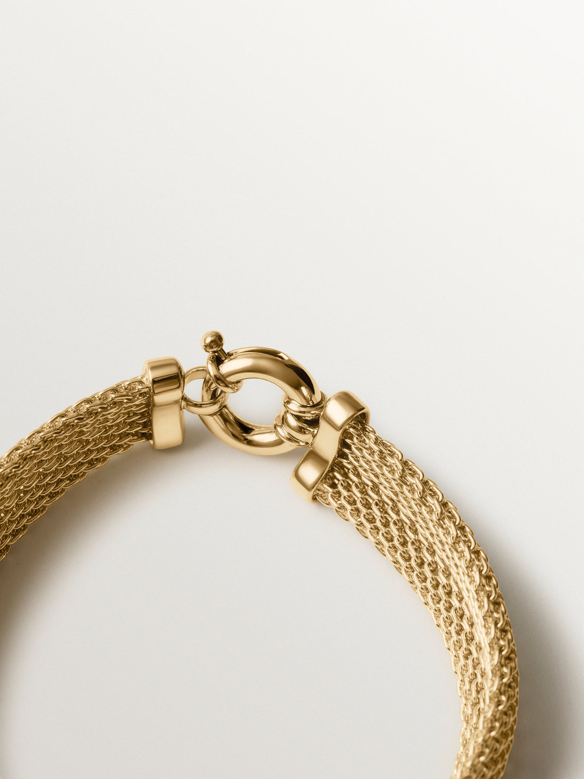 Pulsera de malla bañada en oro amarillo 
