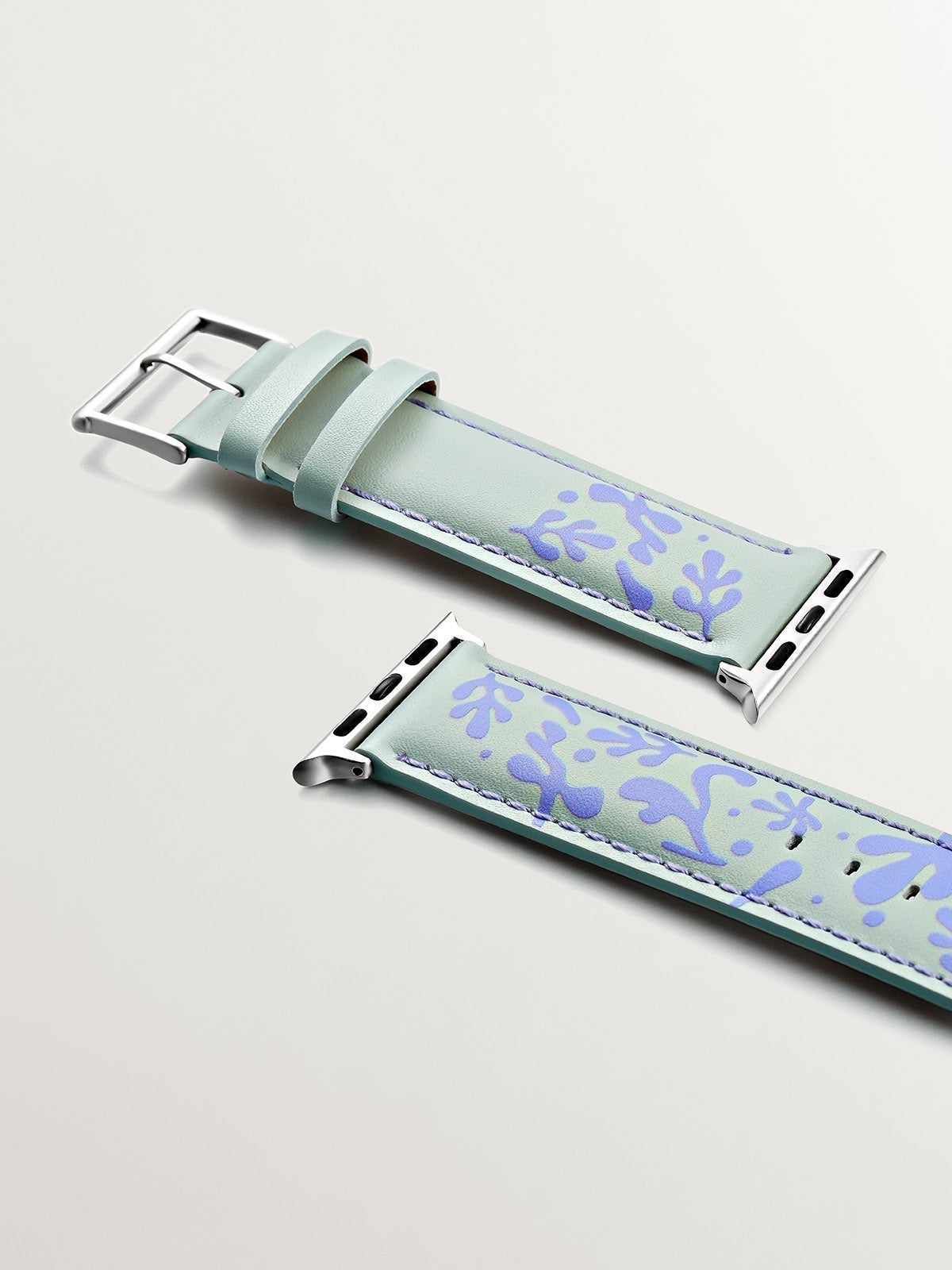 Correa para Apple Watch de cuero verde y lila con estampado floral