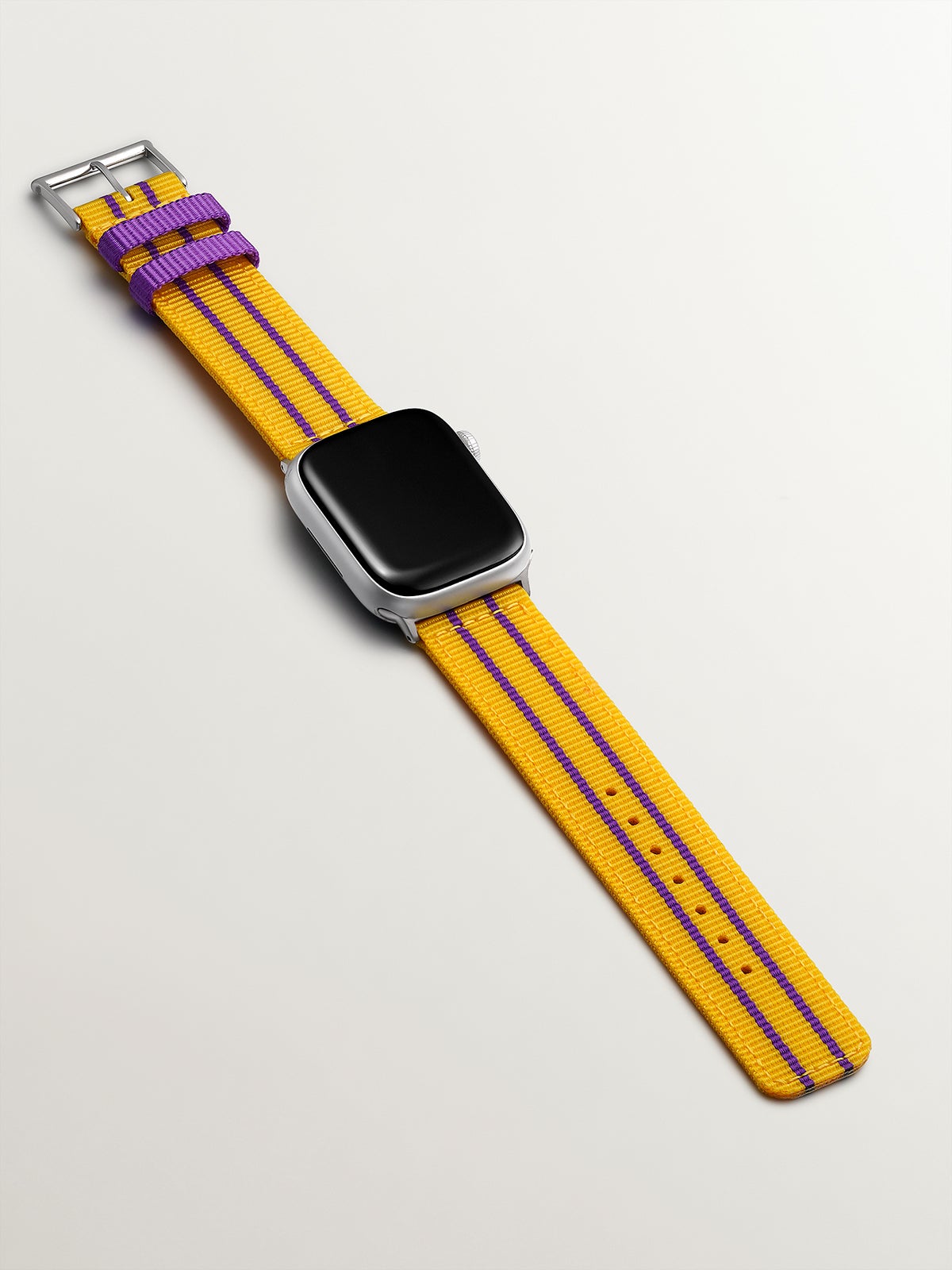 Nylon strap for Apple Watch with yellow and purple stripes.