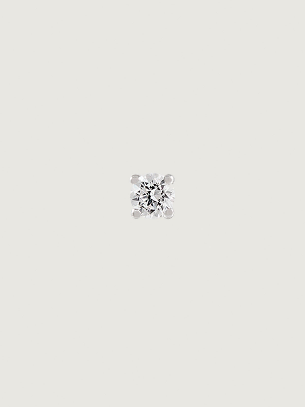 Pendiente individual de oro blanco con diamante de 0,05cts