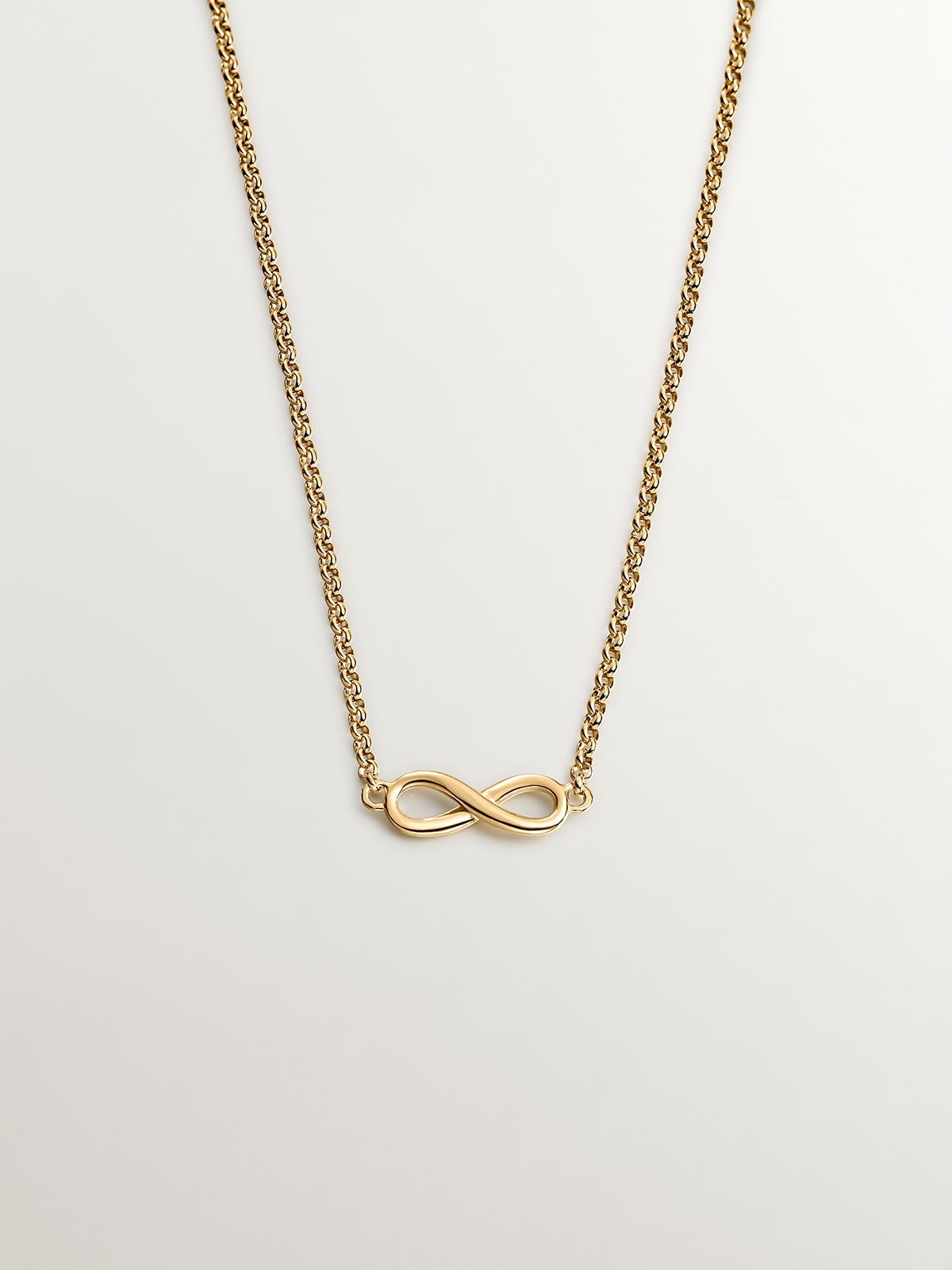Colgante de plata 925 bañada en oro amarillo de 18K con infinito
