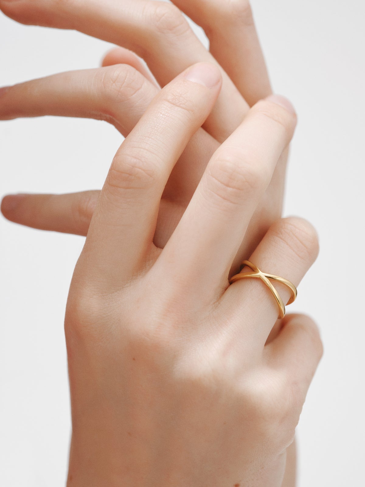 Anillo doble cruzado de plata 925 bañada en oro amarillo de 18K