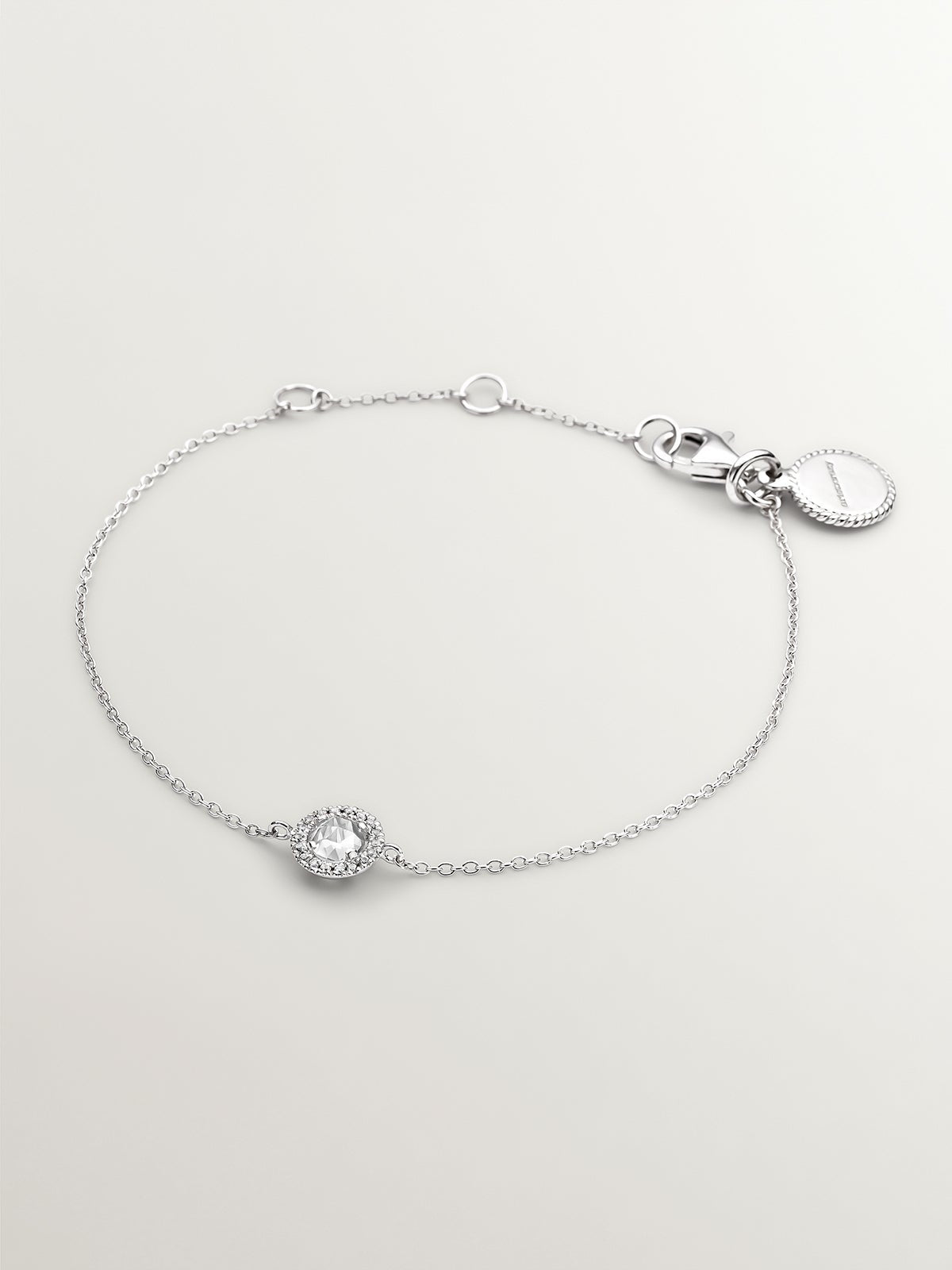 Pulsera de plata 925 con topacio blanco y orla de zafiros blancos