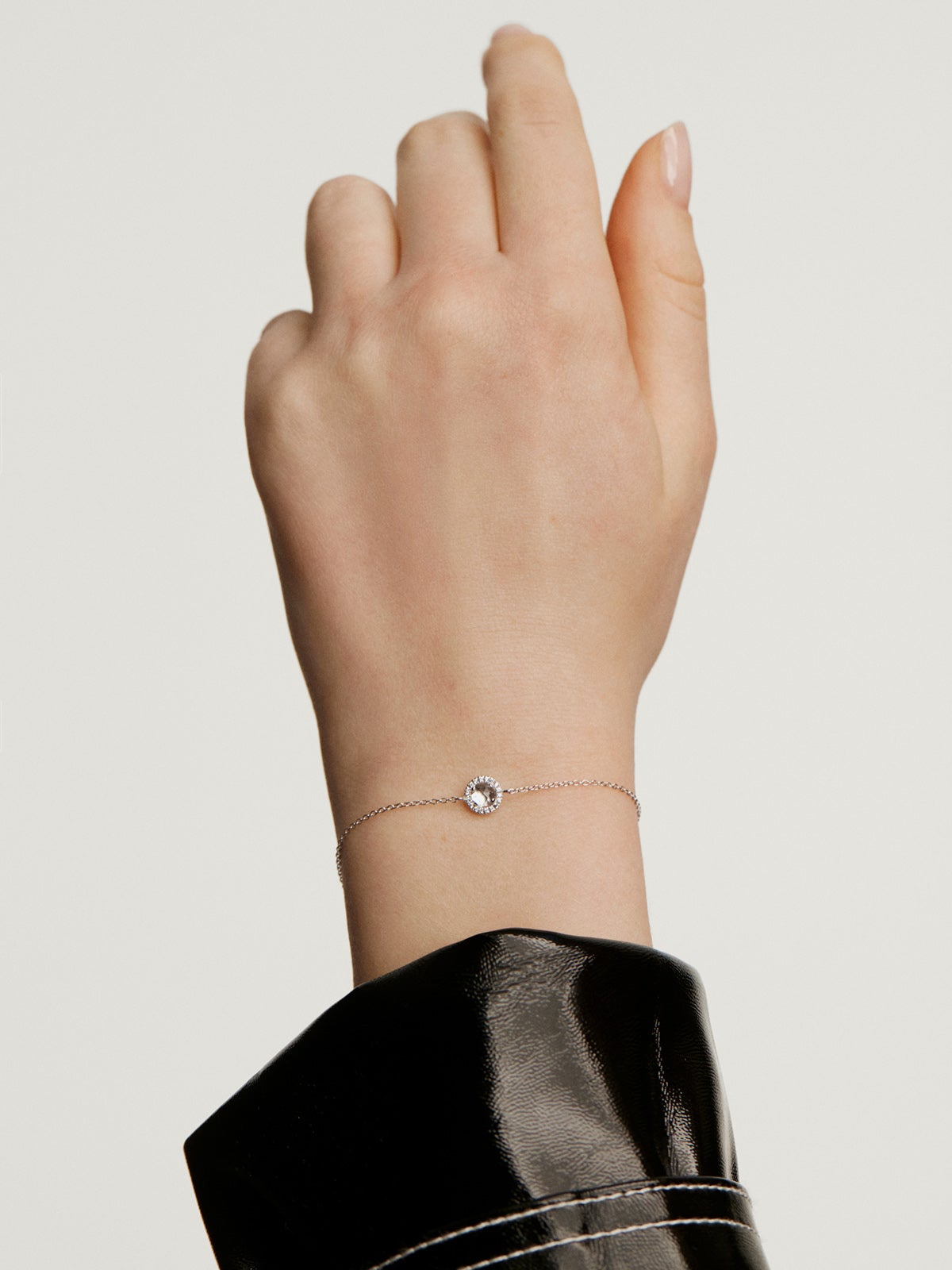 Pulsera de plata 925 con topacio blanco y orla de zafiros blancos