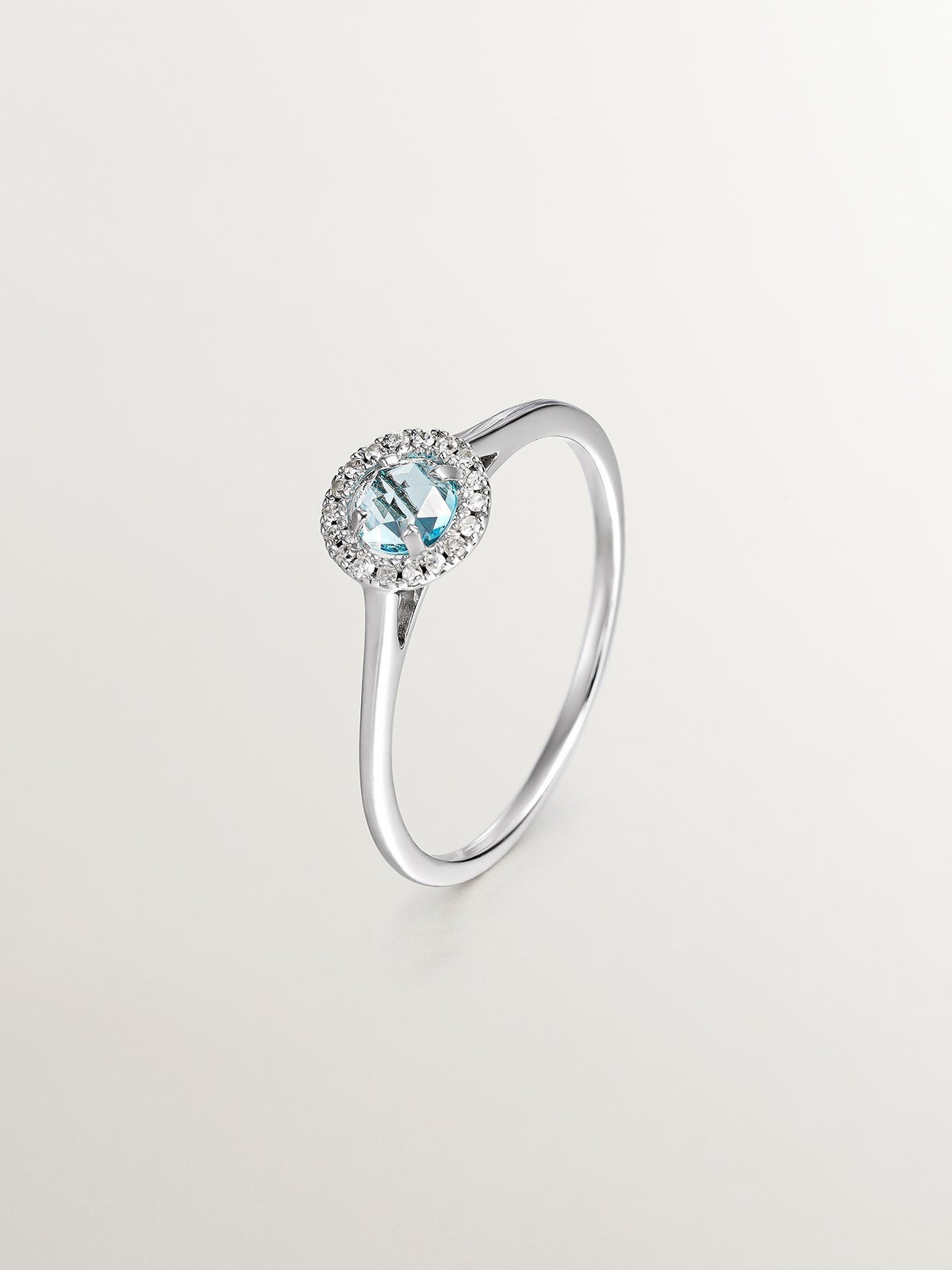 Anillo de plata 925 con topacio azul y diamantes