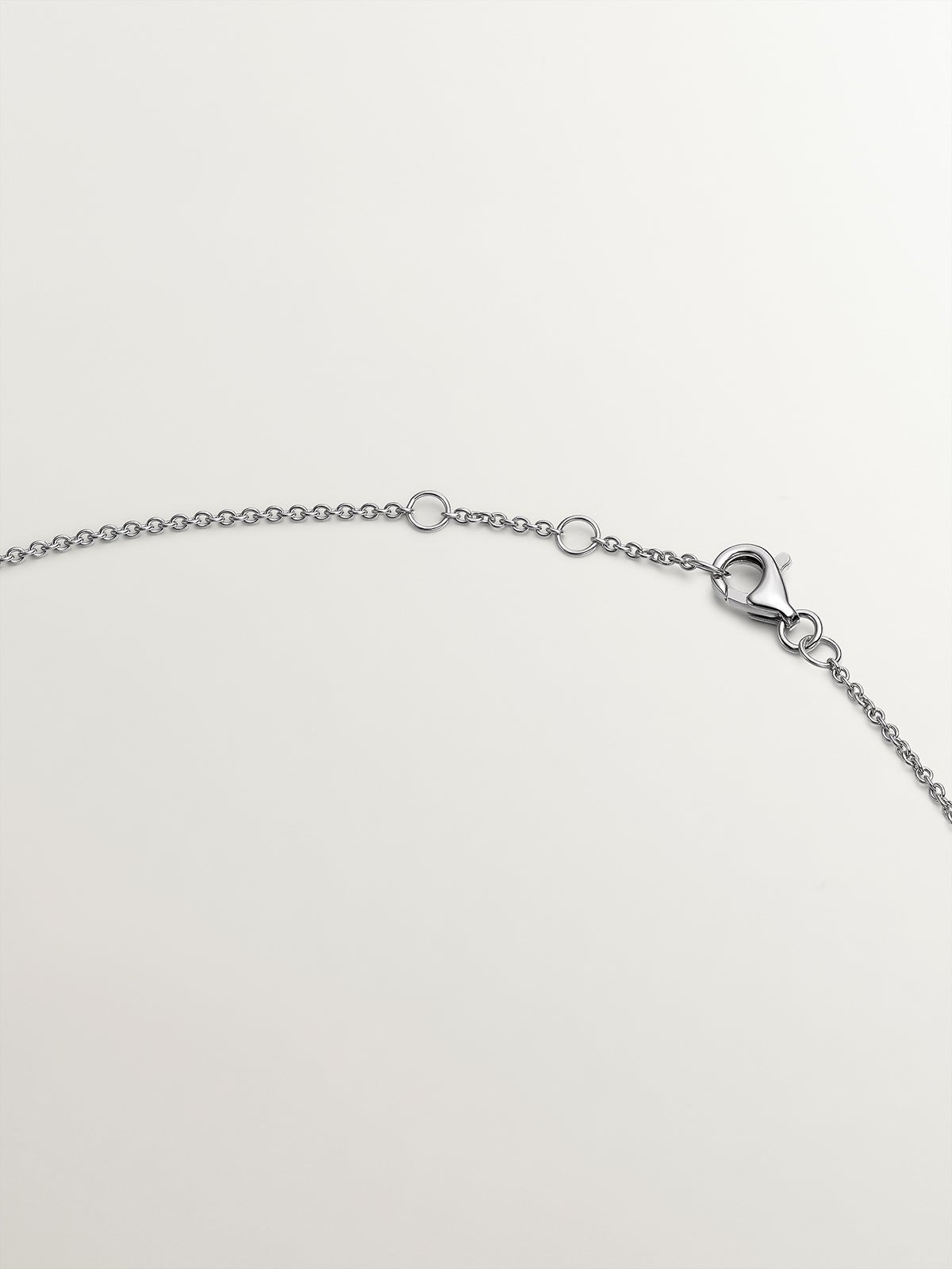 Colgante de oro blanco de 18K con diamante 0,1 cts