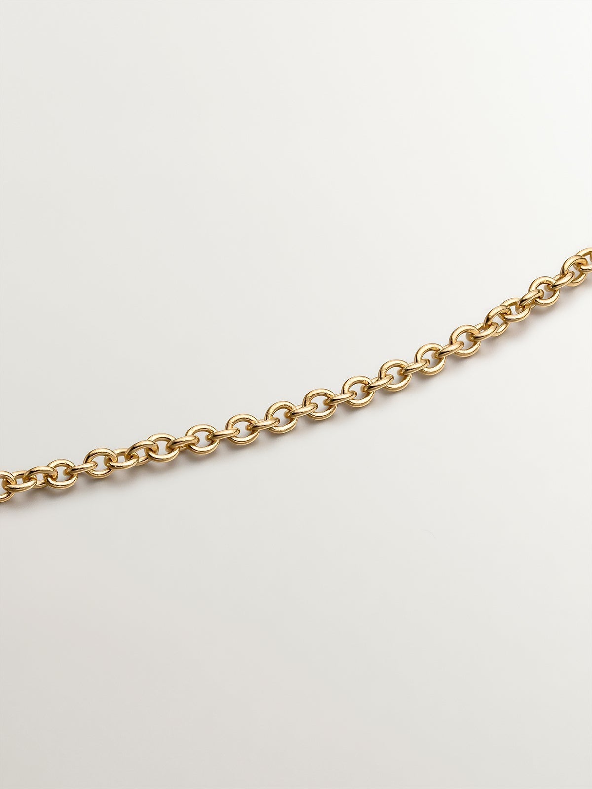 Colgante solitario de oro amarillo de 18K con diamante de 0,15 cts