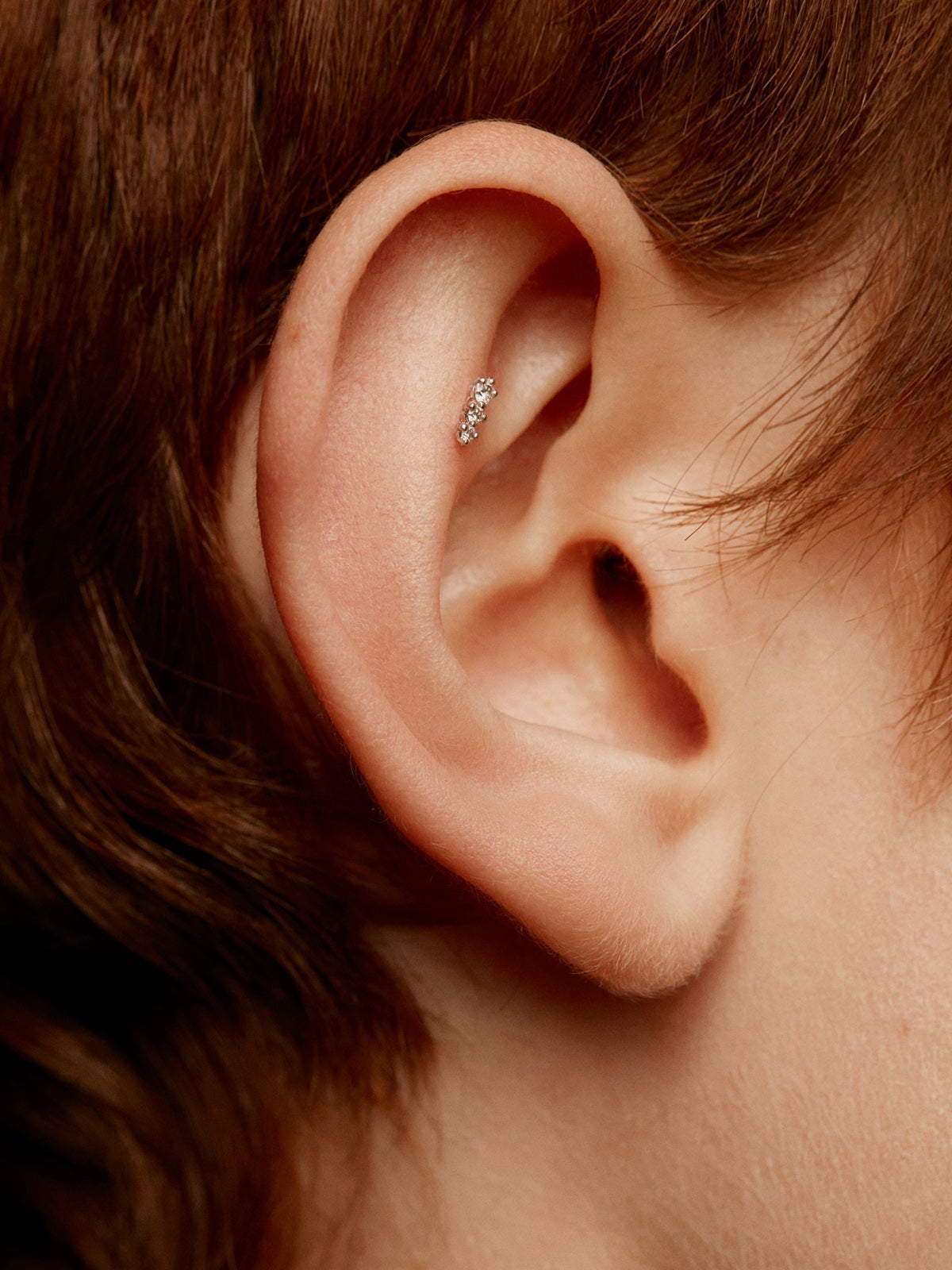 Piercing de oro blanco de 18k con diamantes