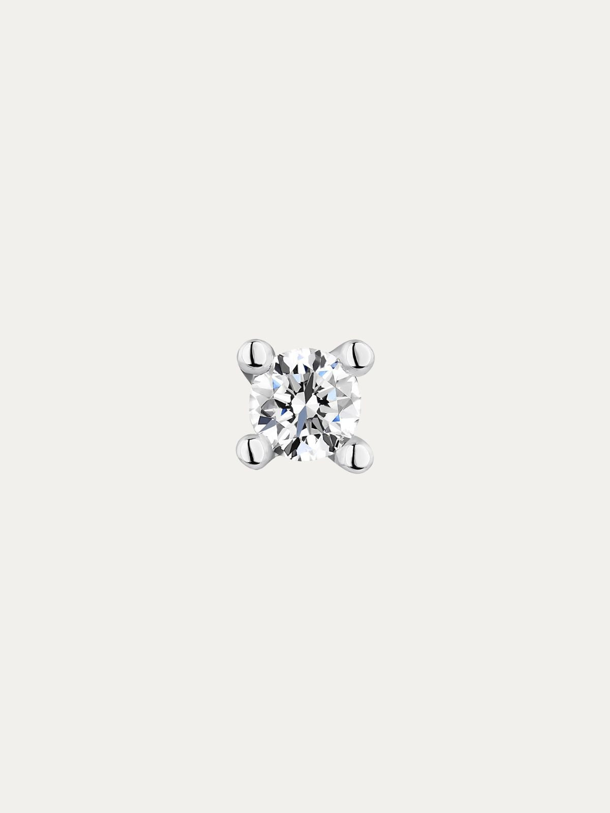 Pendiente solitario de oro blanco de 18K con diamante 0,07 cts