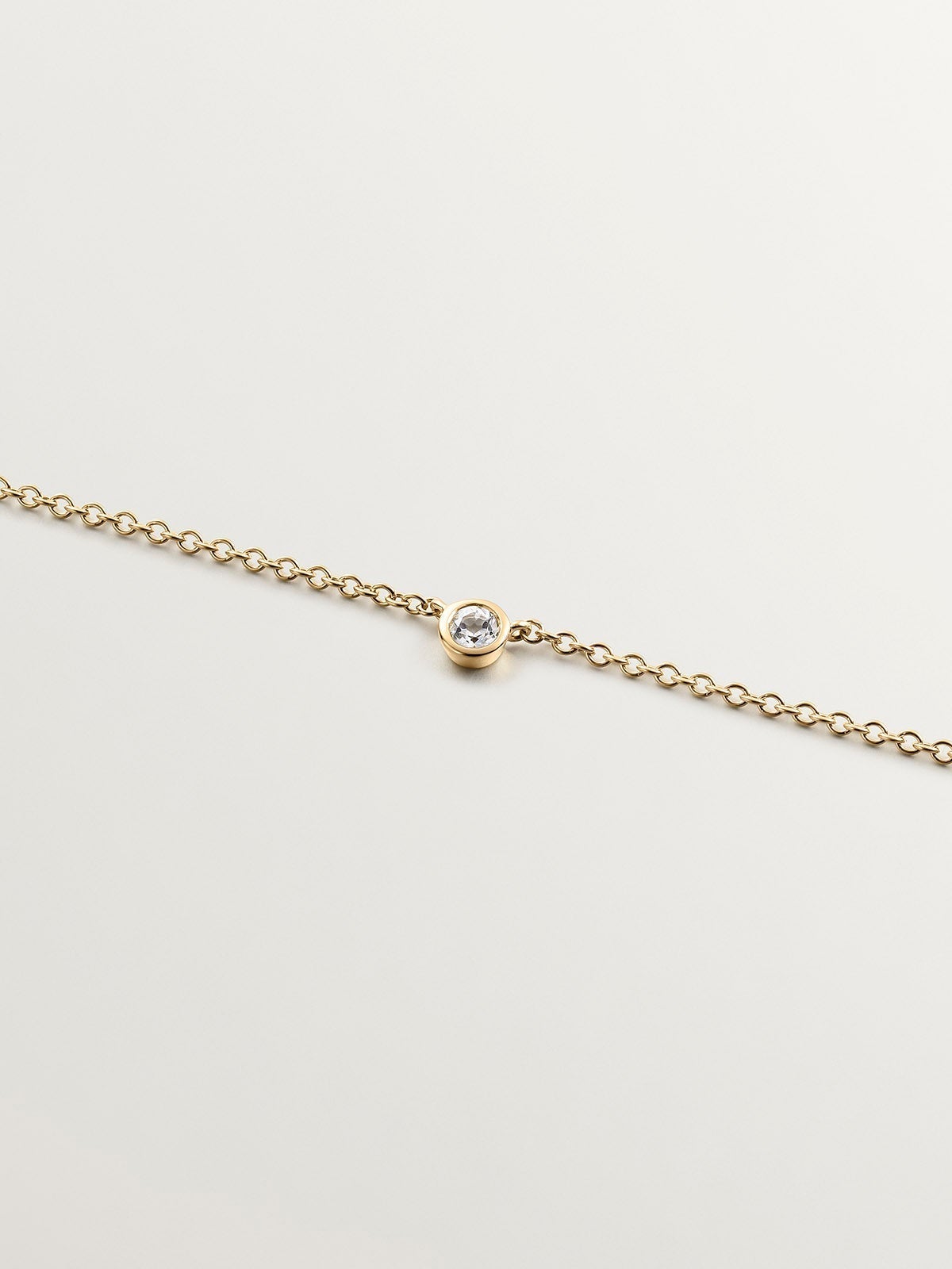 Colgante solitario de plata 925 bañada en oro amarillo de 18K con topacio blanco