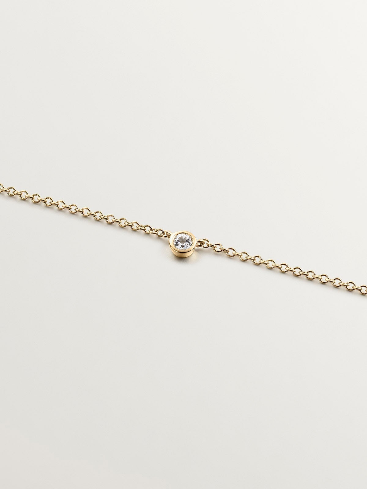 Colgante solitario de plata 925 bañada en oro amarillo de 18K con topacio blanco