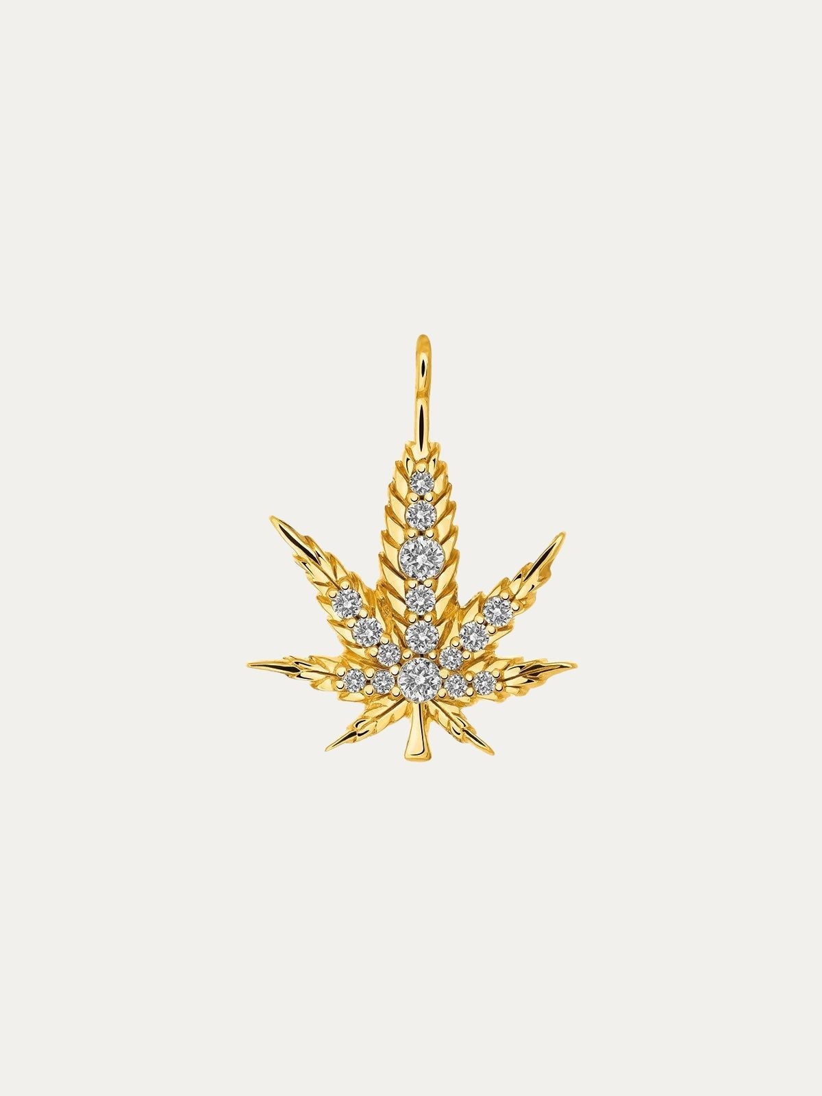 Charm de plata 925 bañada en oro amarillo de 18K con topacios blancos y forma de hoja