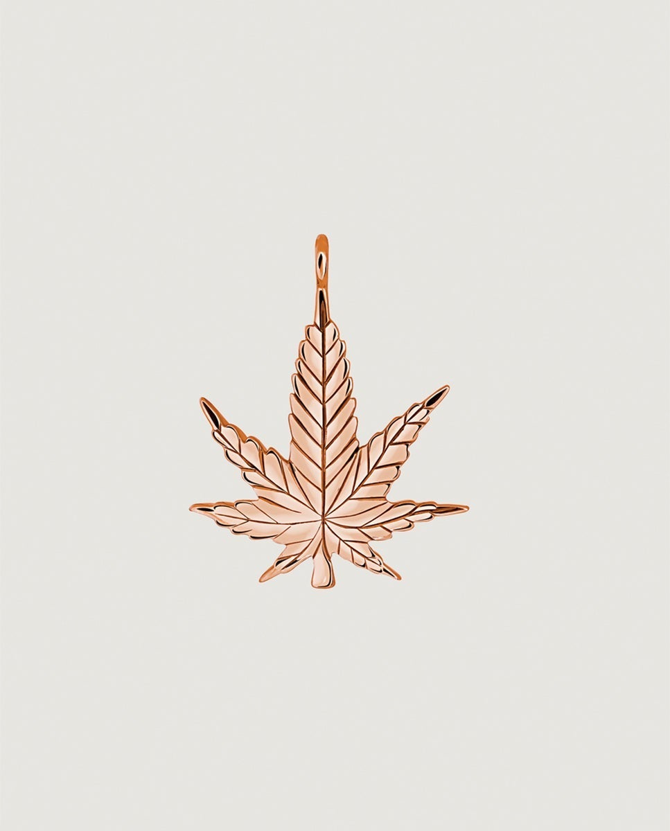 Charm de plata 925 bañada en oro rosa de 18K con forma de hoja y topacios blancos