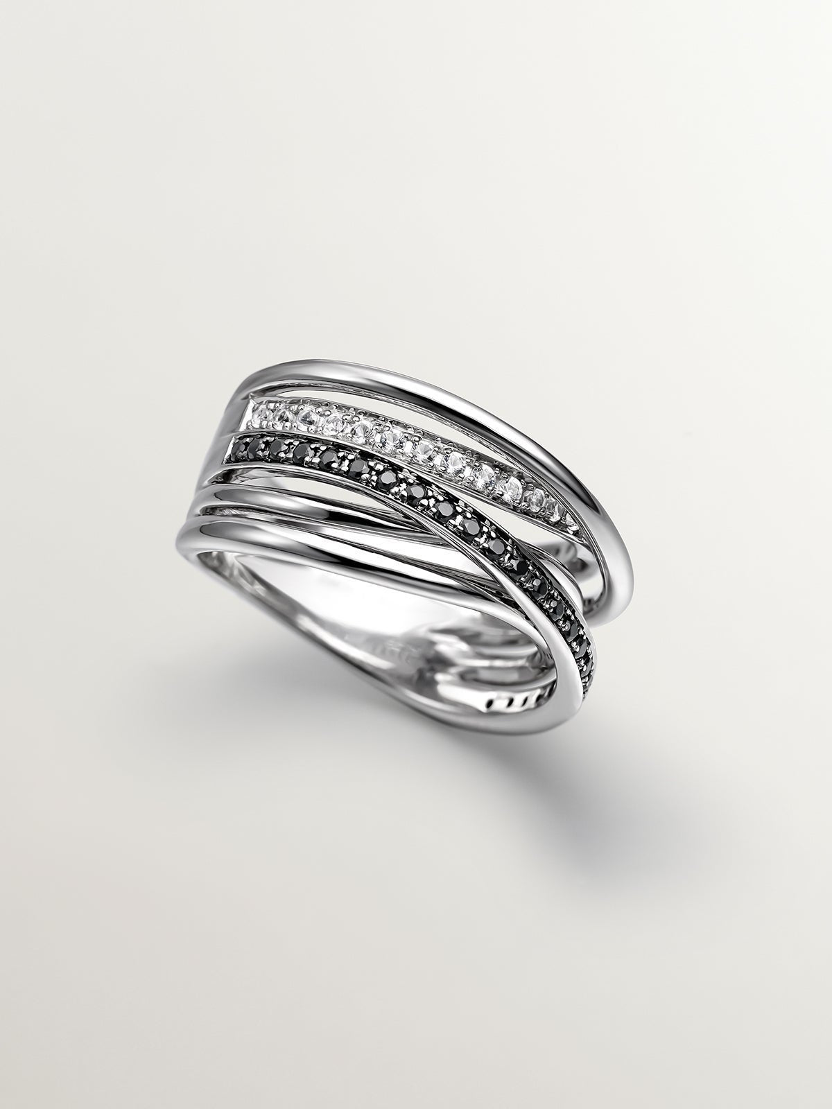 Anillo multibrazo de plata 925 con topacios blancos y espinelas negras