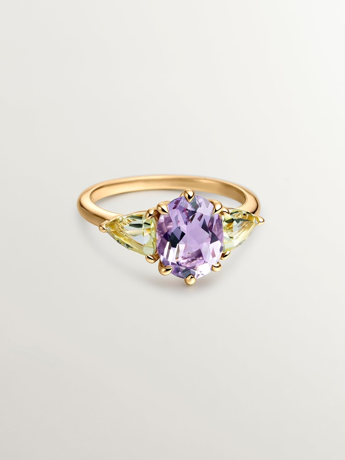 Anillo tresillo de plata 925 bañada en oro amarillo de 18K con amatista morada y cuarzos amarillos