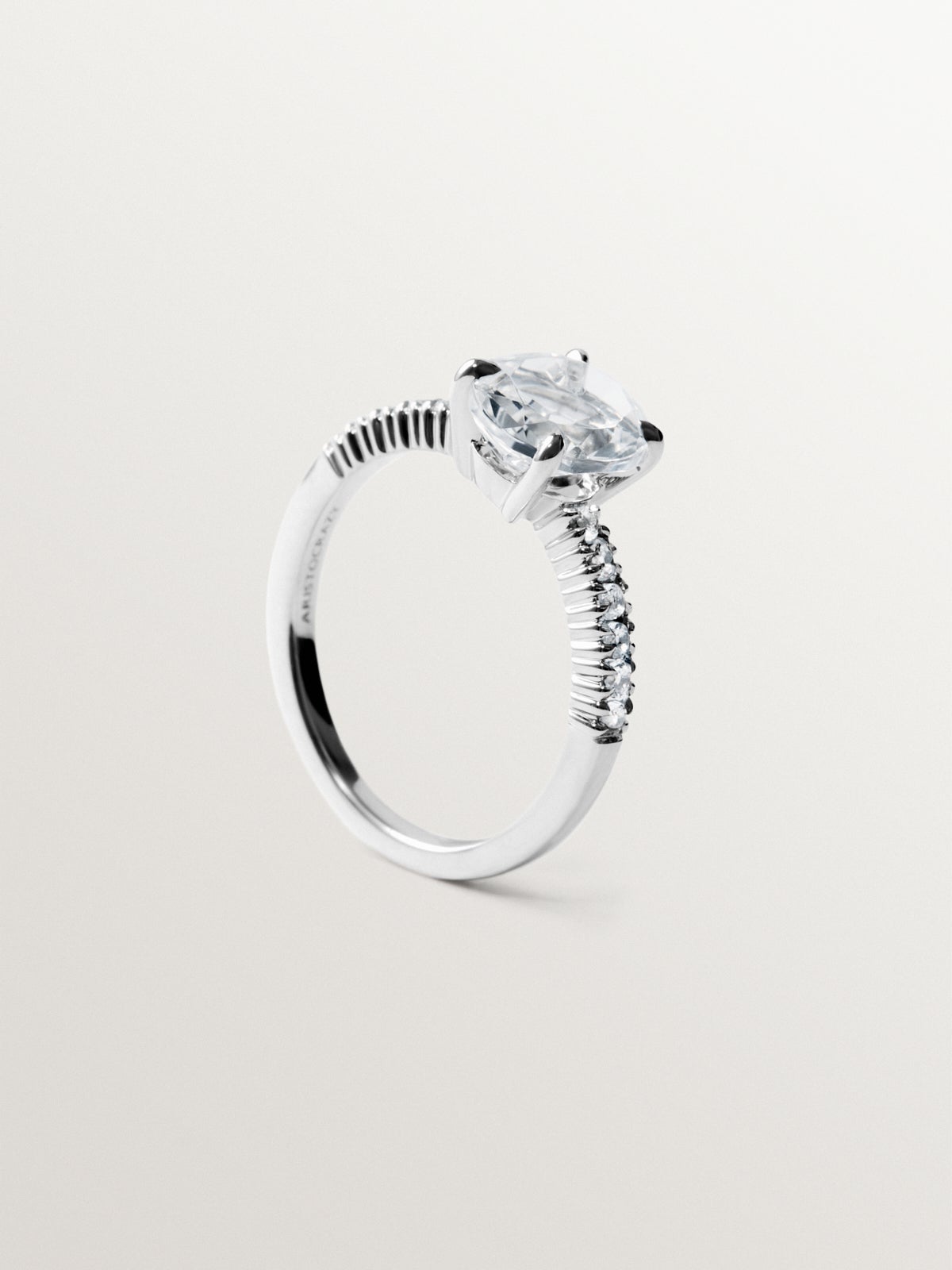 Anillo solitario de plata 925 con cuarzo y topacios blancos