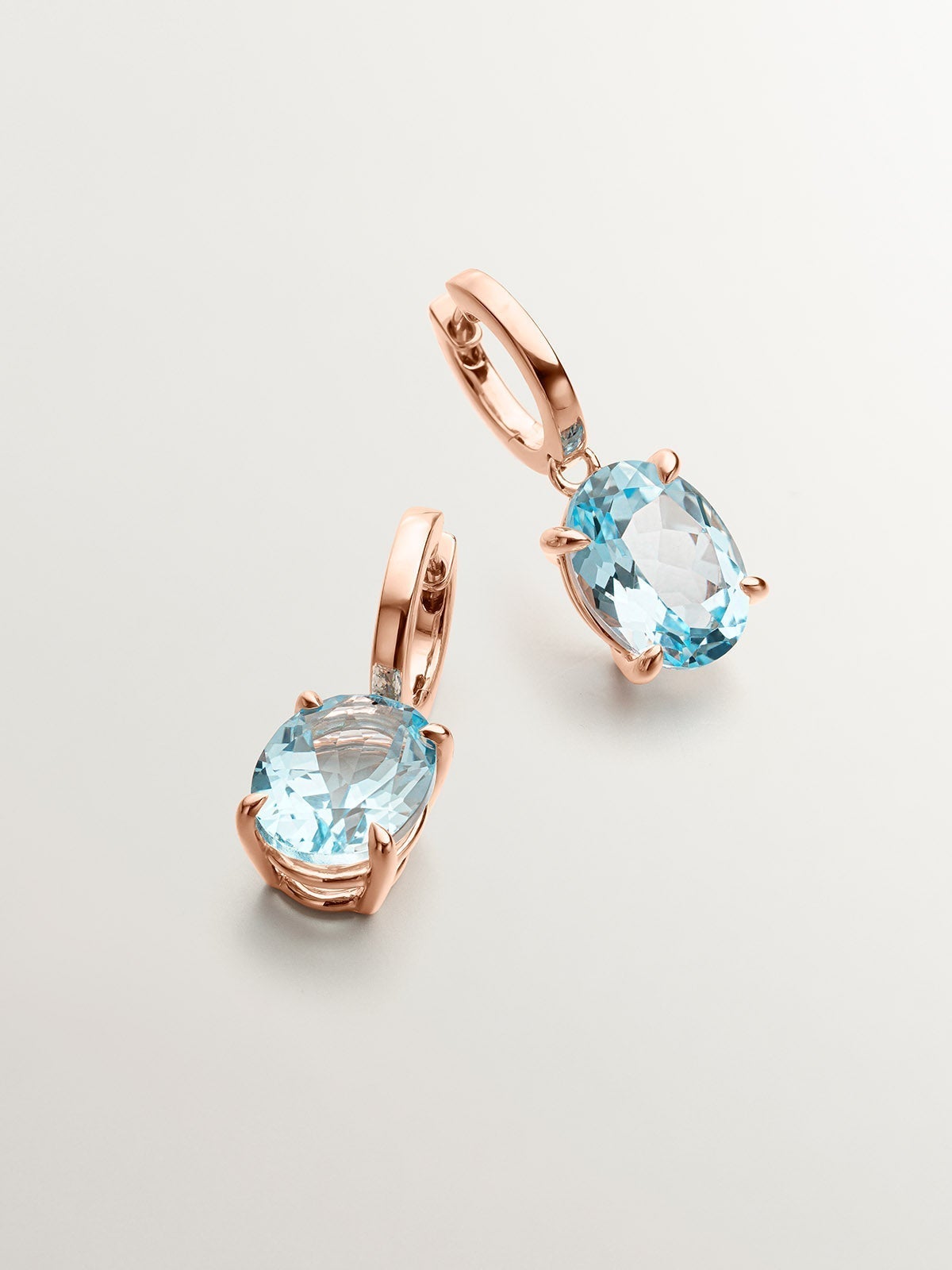 Pendientes de aro grandes de plata 925 bañada en oro rosa de 18K con topacio azul sky
