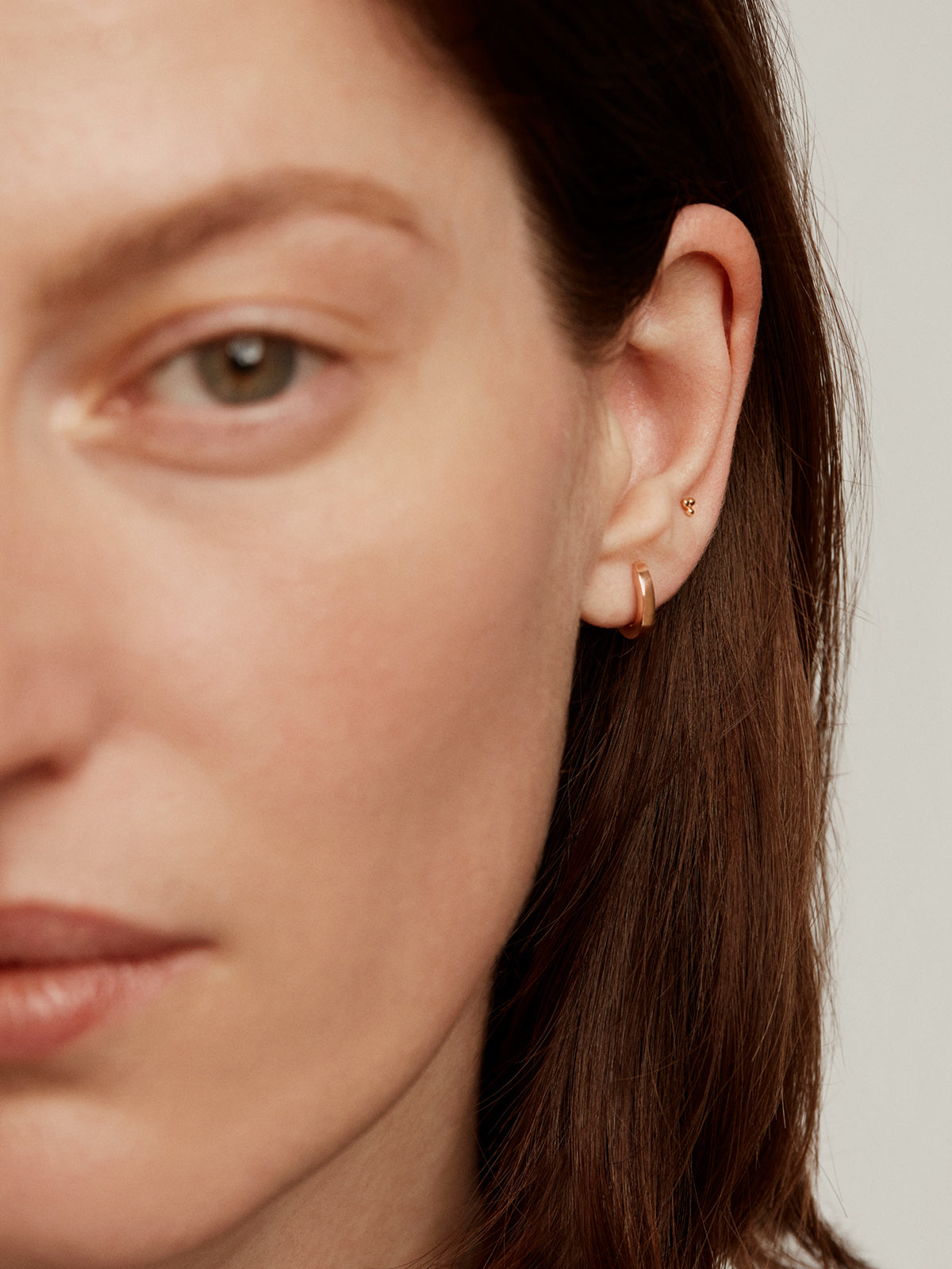 18K yellow gold piercing with triple ball