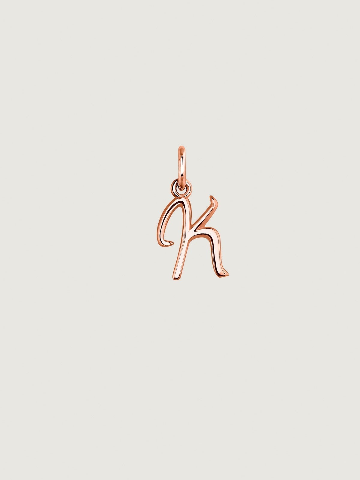 Charm de plata 925 bañada en oro rosa de 18K con inicial K