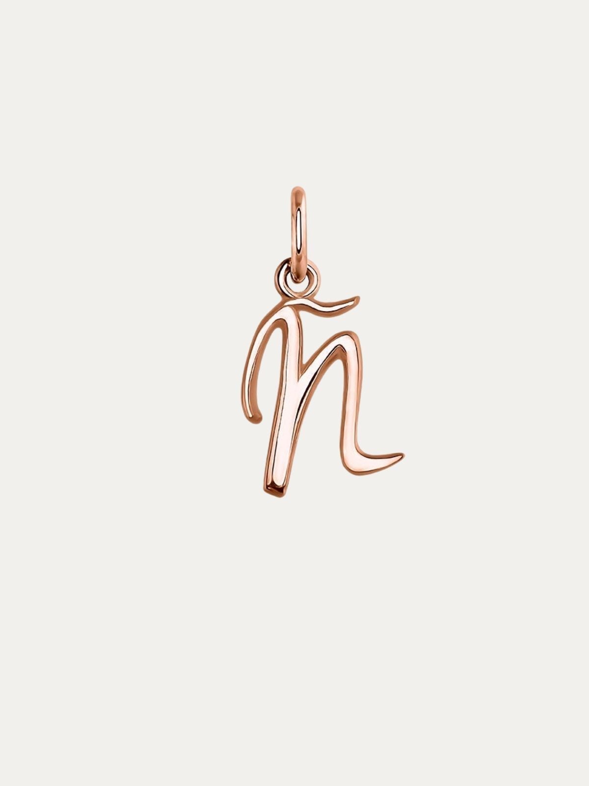 Charm de plata 925 bañada en oro rosa de 18K con letra Ñ