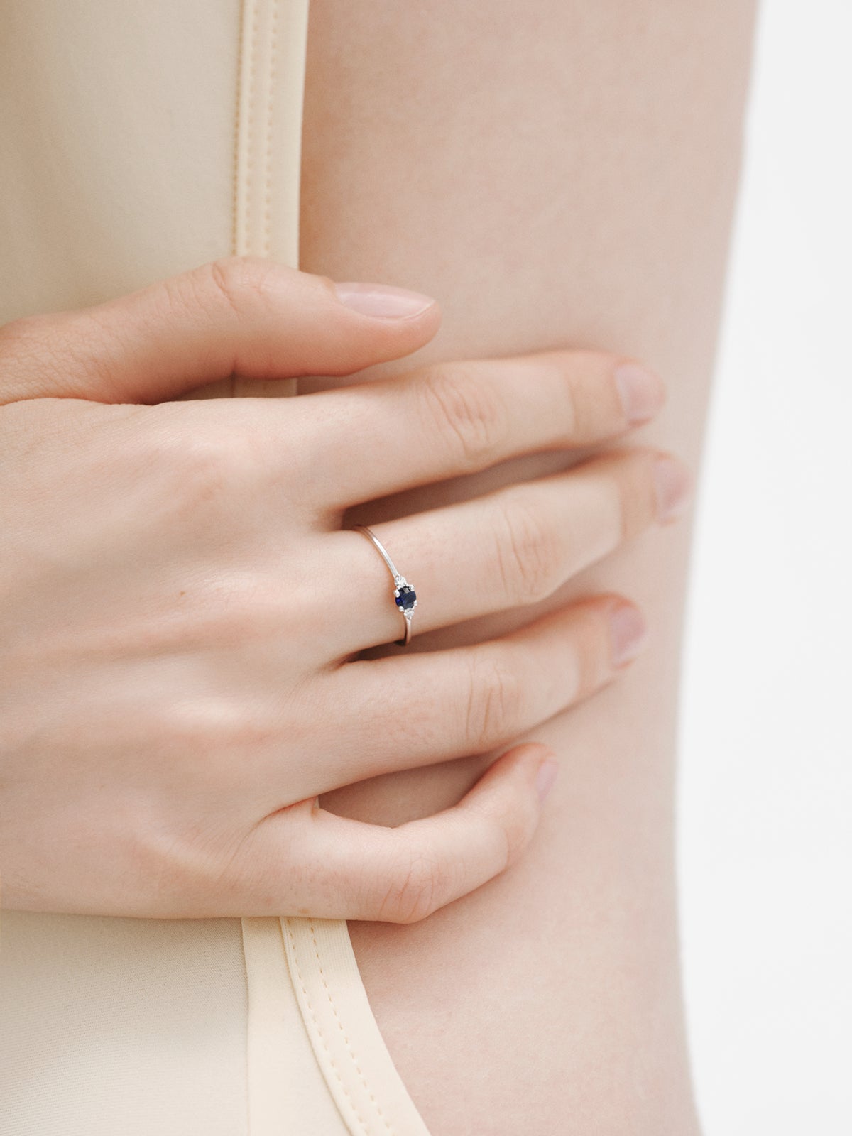 9K White Gold Ring with Blue Sapphire and Diamonds