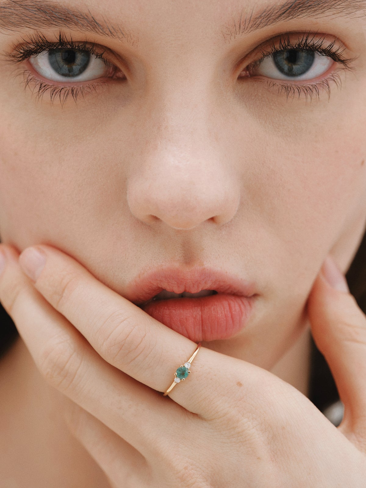9K Yellow Gold Trilogy Ring with Emerald and Diamonds