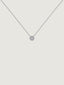 Colgante de oro blanco de 18K con diamante central de 0,05cts y orla de diamantes