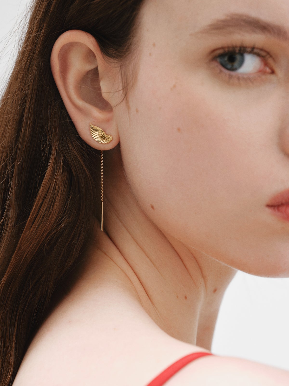 Pendientes largos de plata 925 bañada en oro amarillo de 18K con alas