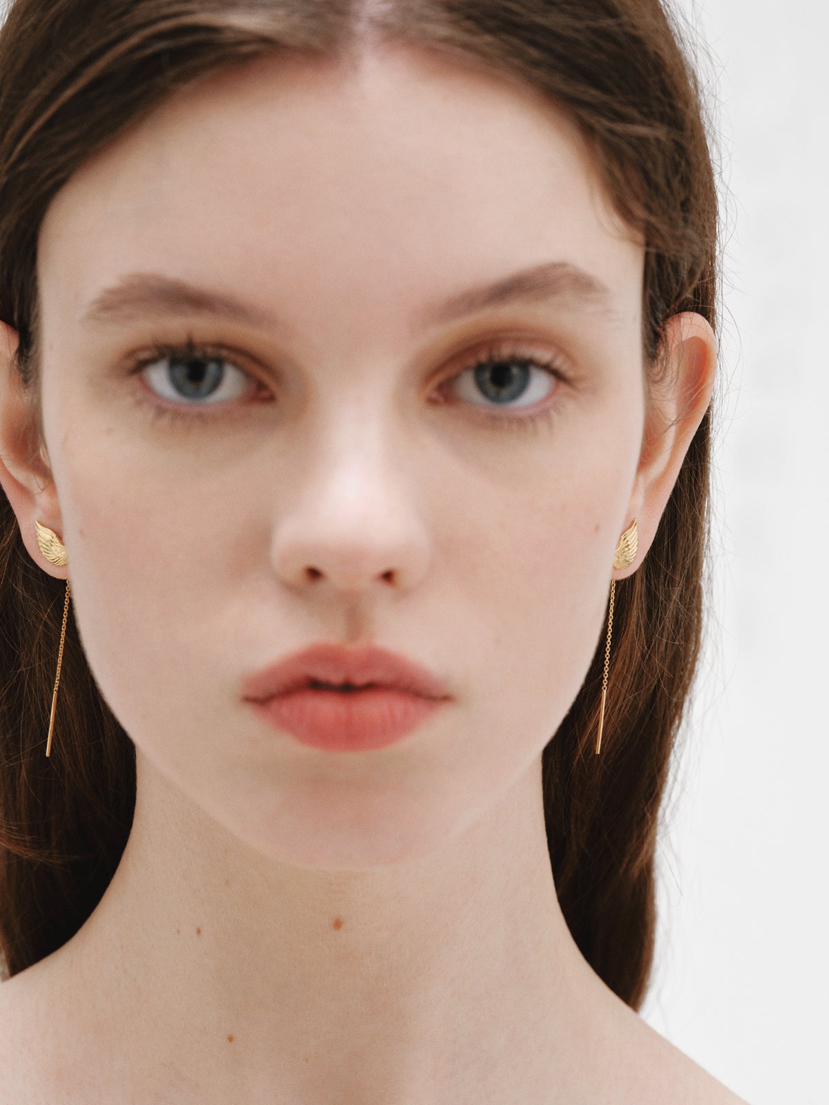 Boucles d'oreilles longues en argent 925 plaqué or jaune 18K avec des ailes